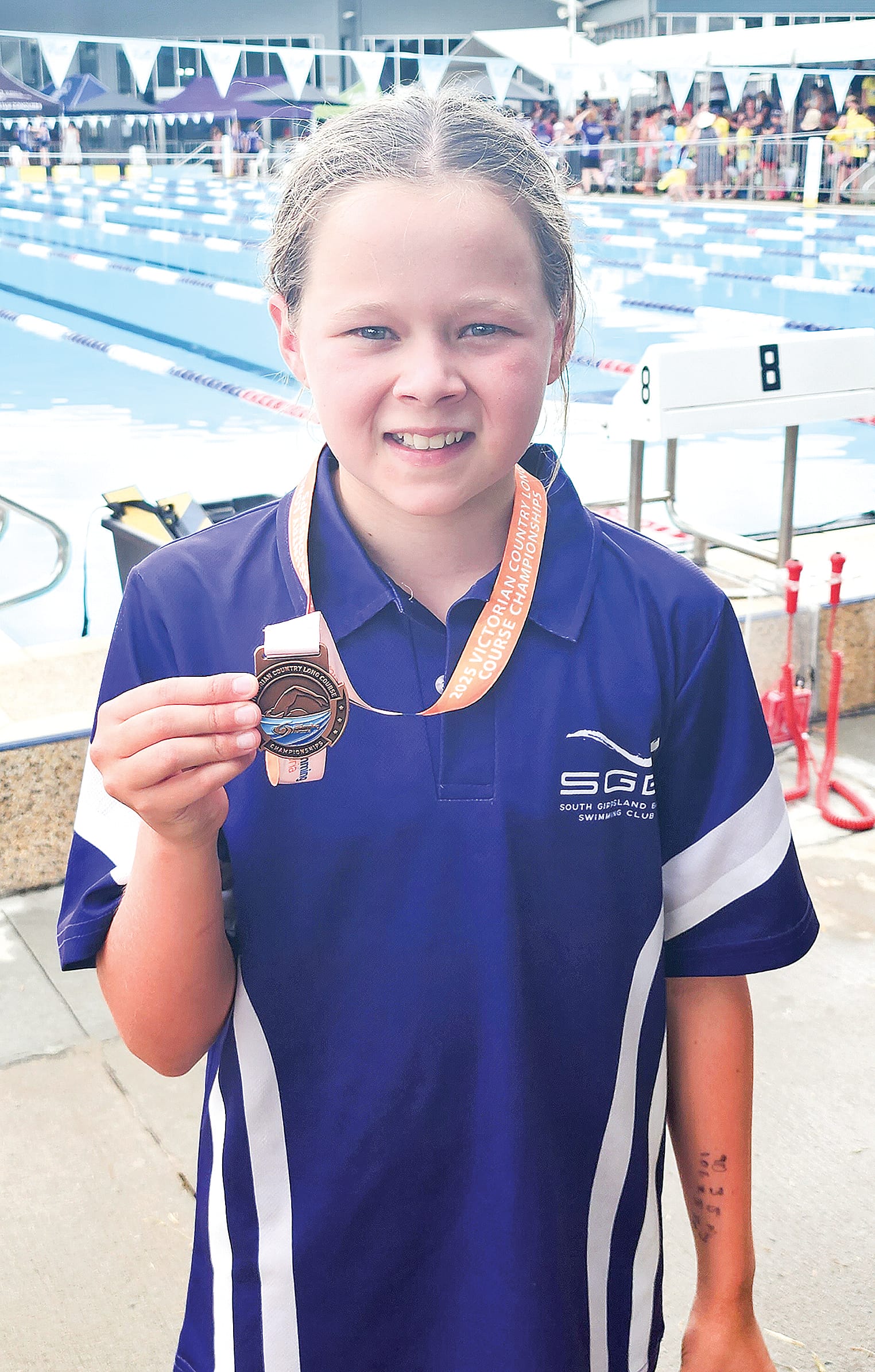 Josie landed a third-place medal in the 50 metres breaststroke.