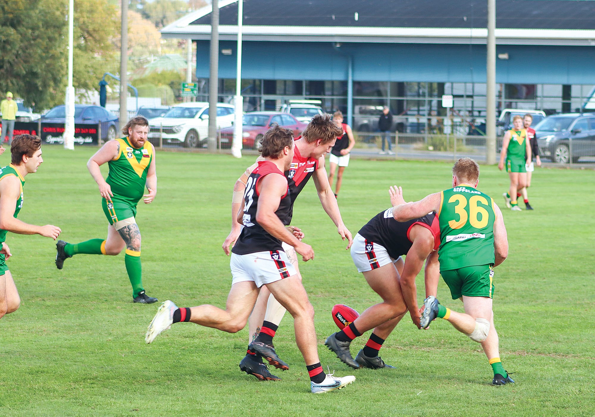 Parrot Matt Borschman battles a trio of Warragul opponents for the footy, impressing coach Trent McMicking with his efforts throughout the day. A17_1924