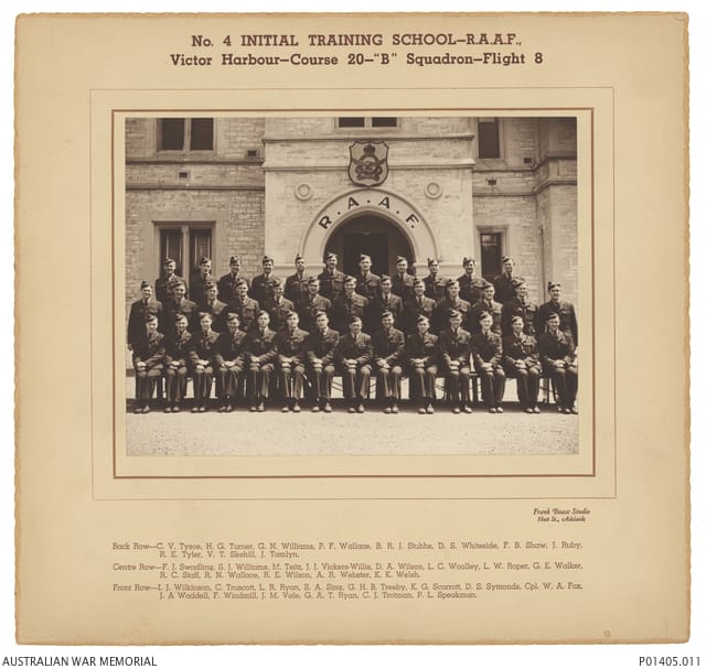 Group portrait of No 4 Initial Training School, RAAF, Course No 20, B Squadron, Flight 8. Identified in the back row from left to right: 409622 Charles Vivian Tysoe (later Flying Officer (FO)); 409620 Herbert Gladstone Turner (later Flight Lieutenant (Flt Lt)); 409623 Geoffrey Neil Williams (later Warrant Officer (WO)); 409627 Peter Fleming Wallace (later Flt Lt); 409609 David Robert James Stubbs (later WO); 409632 Samuel Whiteside (later Pilot Officer (PO) and died on flying operations over Germany on 27 January 1944); 409603 Frank Bernard Shaw (later WO); 409598 Jack Ruby (later WO); 409621 Roy Ernest Tyler (later WO); 409605 Vincent Thomas Skehill (later Flt Lt and awarded Distinguished Flying Cross (DFC)); and 409613 John David Tamlyn (later WO and died in an accident at Wagga Wagga, NSW on 26 March 1945).
Second row from left to right: 409610 Francis James Swadling (later WO); 409635 Stanley James Williams (later Flt Lt); M Teitz (probably 409614 Godfred Samuel Teitz (later FO and awarded DFC)); 409626 James John Vickers-Willis (later Flt Lt); 409636 Donald Allen Wilson (later Flt Lt); 409638 Lindsay Charles Woolley (later Flt Lt and awarded DFC); 409597 Leslie Walter Roper (later FO and died on flying operations over Germany on 4 September 1943); 409629 Geoffrey Edgar Walker (later Flt Lt and awarded DFC); 409608 Raymond Charles Staff (later WO);409639 LAC Roy Neil Wallace (killed in an accident at Wagga Wagga NSW on 31 July 1942); 409624 Ronald Eustice Wilson (later WO and died on flying operations over Yugoslavia on 23 February 1944); 409630 Alan Robert Webster (later FO and died on flying operations over Dutch New Guinea on 11 August 1944); and 409631 Kelvin Kenneth Welsh (later Flt Lt).
Front row from left to right: 409634 Ian James Wilkinson (later Flt Lt); 409619 Edward Charles Truscott (later FO and died on flying operations over Germany on 2 January 1945); 409612 Laurence Richard Ryan (later Flt Lt); 409604 Sydney Albert Sing (later FO); 409616 George Henry Brown Treeby (later Flt Lt); 409601 Keith George Scarrott (later FO); 409611 David Stanley Symonds (later Flt Lt and awarded DFC); 39392 Corporal William Arthur Osborne Fox (later WO 39392); 409628 John Alfred Waddell (later FO); 409637 Frank Windmill (later WO); 409625 James Maxwell Vale (later FO); 409599 George Andrew Terence Ryan (later PO); 409617 Clifford John Trotman (later PO and died on flying operations over Germany on 29 January 1944); and 409606 Percival Lee Speakman (later FO).