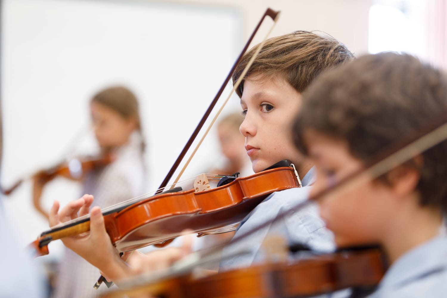 Theodore Wilson participates in weekly violin lessons in Junior School. 