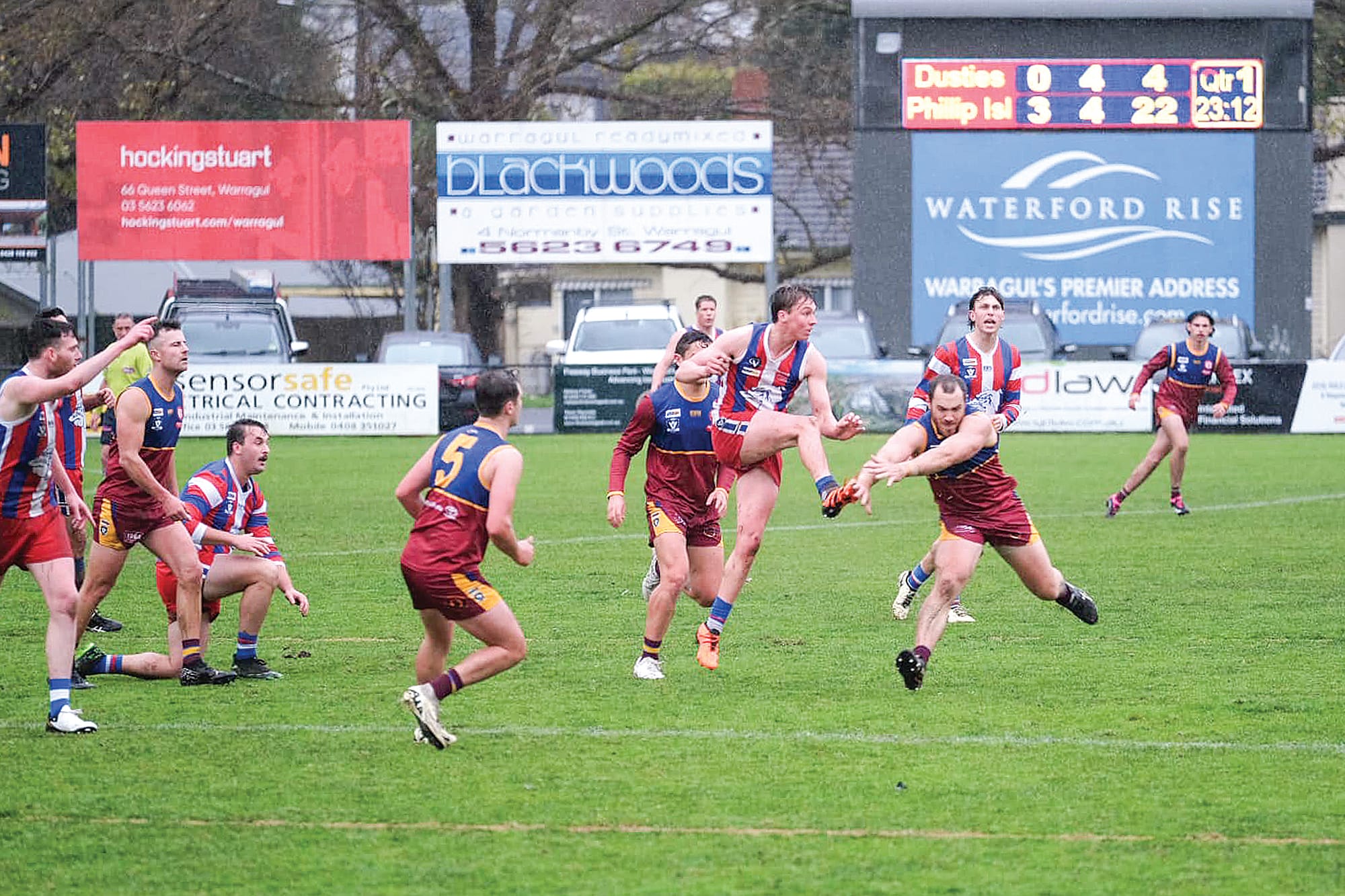 Island triumphs in rain-soaked clash against Industrials