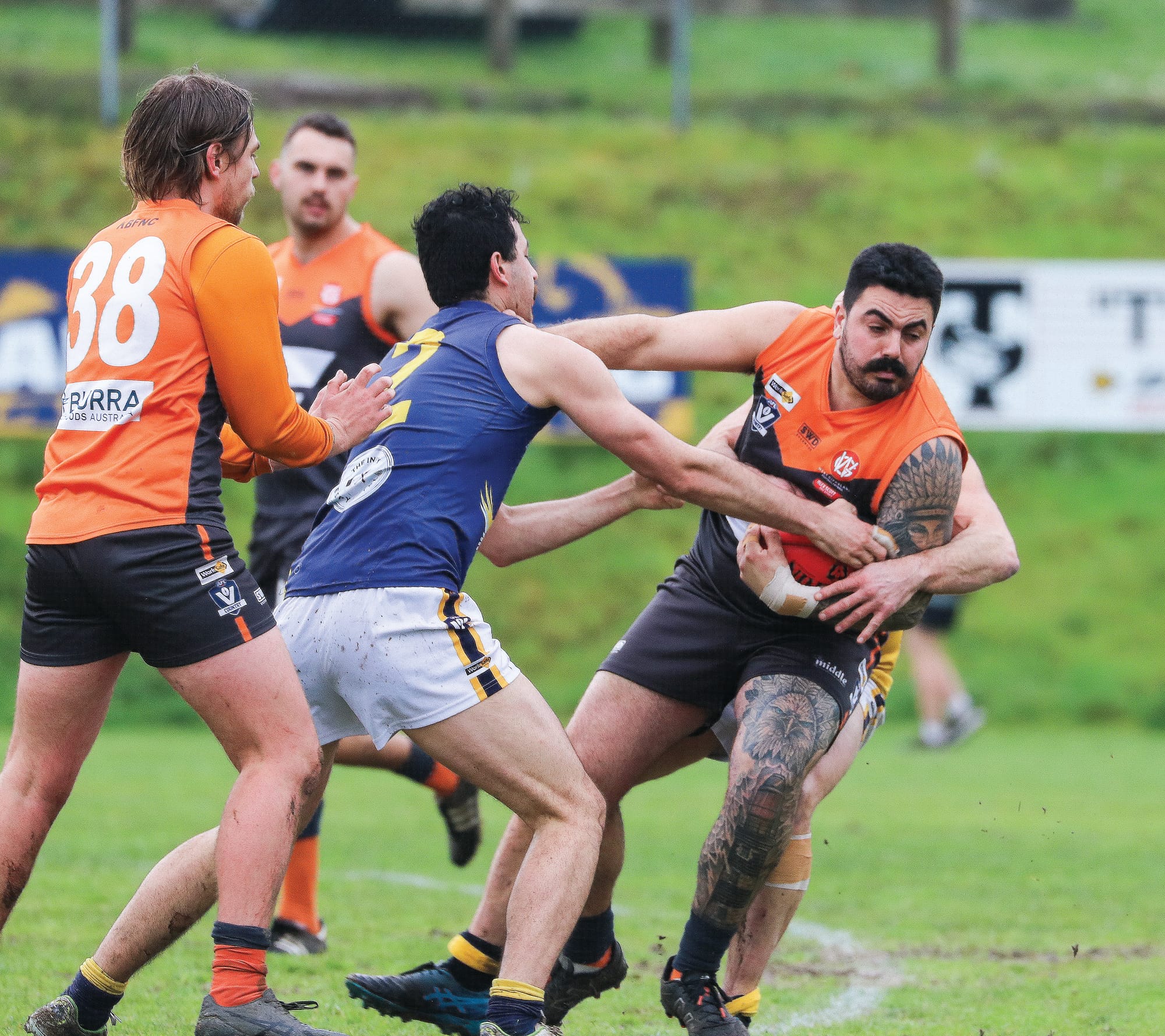 Jasper Macri fights against good pressure from Inverloch Kongwak’s Andrew Soumilas. Z43_3323