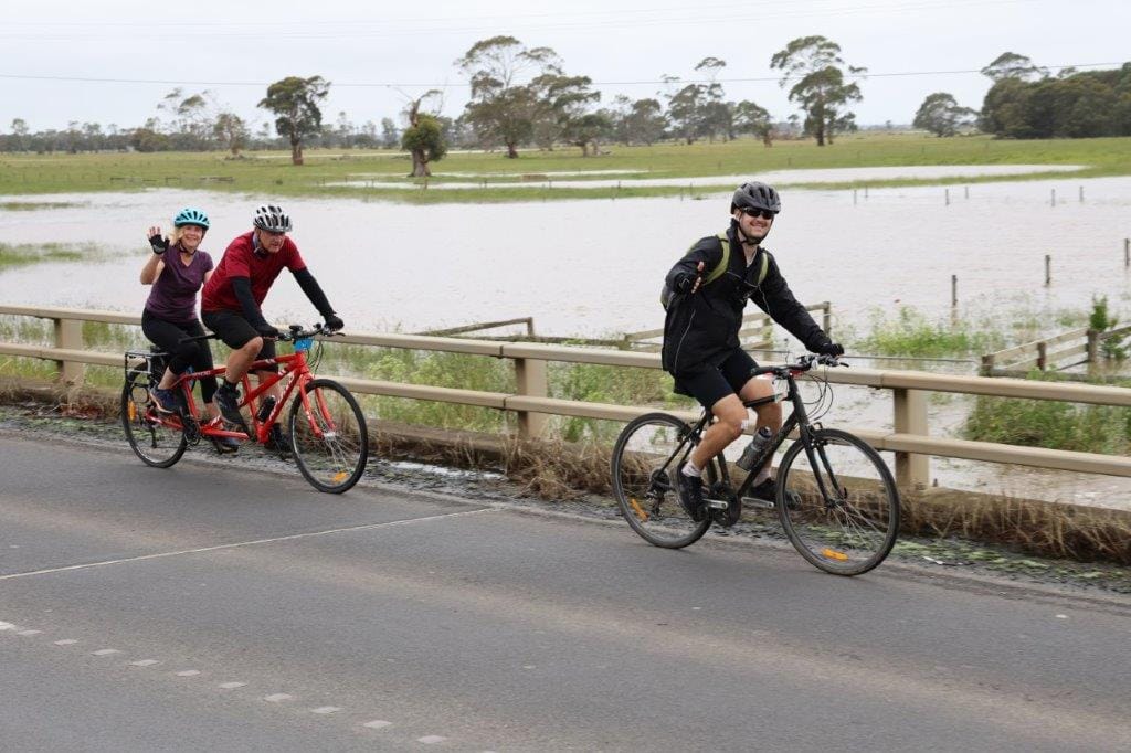 Riders arrive in Yarram on Friday not knowing if they would be able to continue their joryney on Saturday morning with the flooded Albert River closing the South Gippsland Highway.