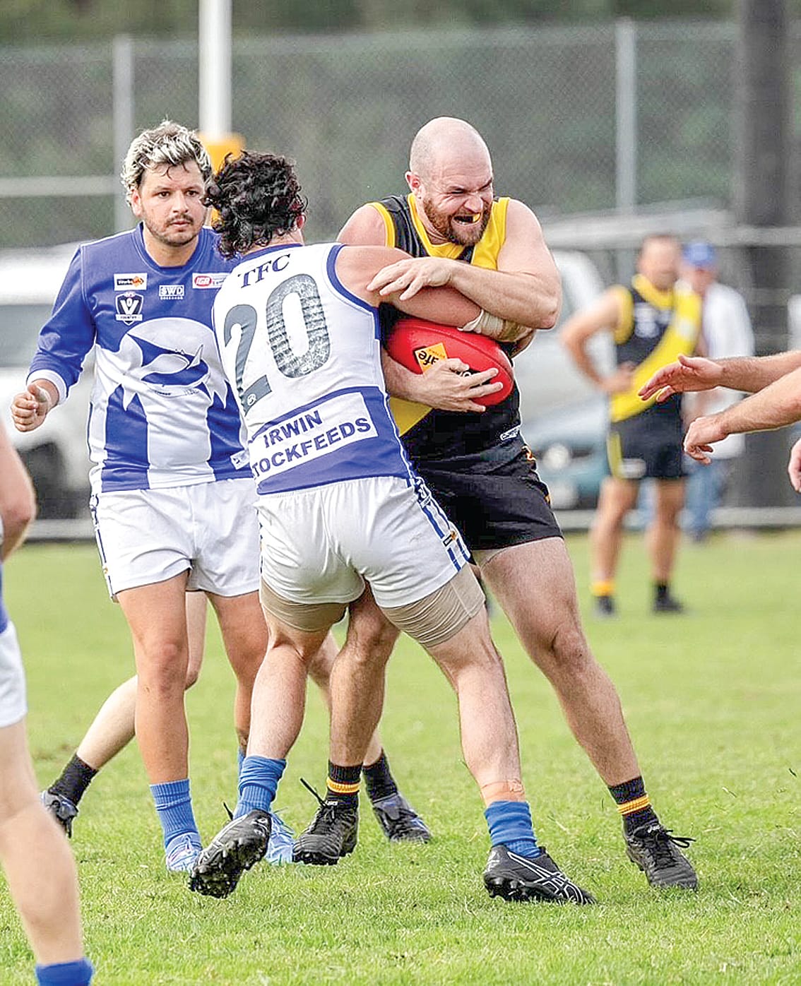 Luke Gervasi plays through the tackle against the Sharks. Photos: Annie Holland