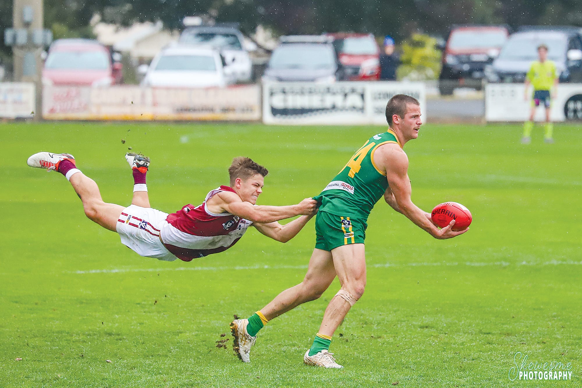 Cam Olden beats off a flying tackle from his opponent on Saturday’s match against Traralgon. Photo Tracey – Skewesme Photography.