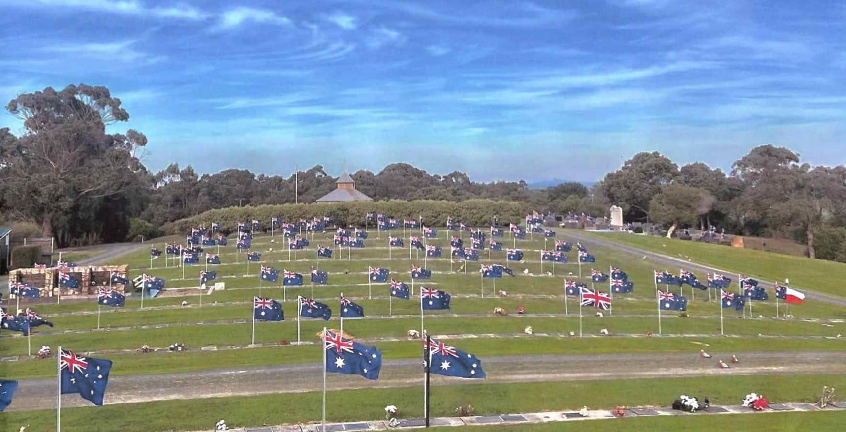 Commemorate flags marked Veterans' graves in the annual event that runs around Anzac Day.