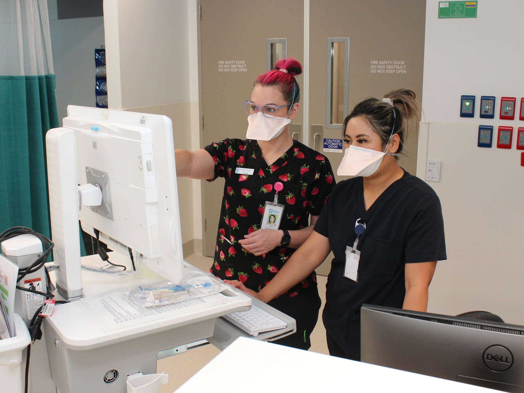 Registered Nurses Amber McDonald, left, and Fran Salamat at work in the Short Stay Unit of Wonthaggi Hospital’s Emergency Department.