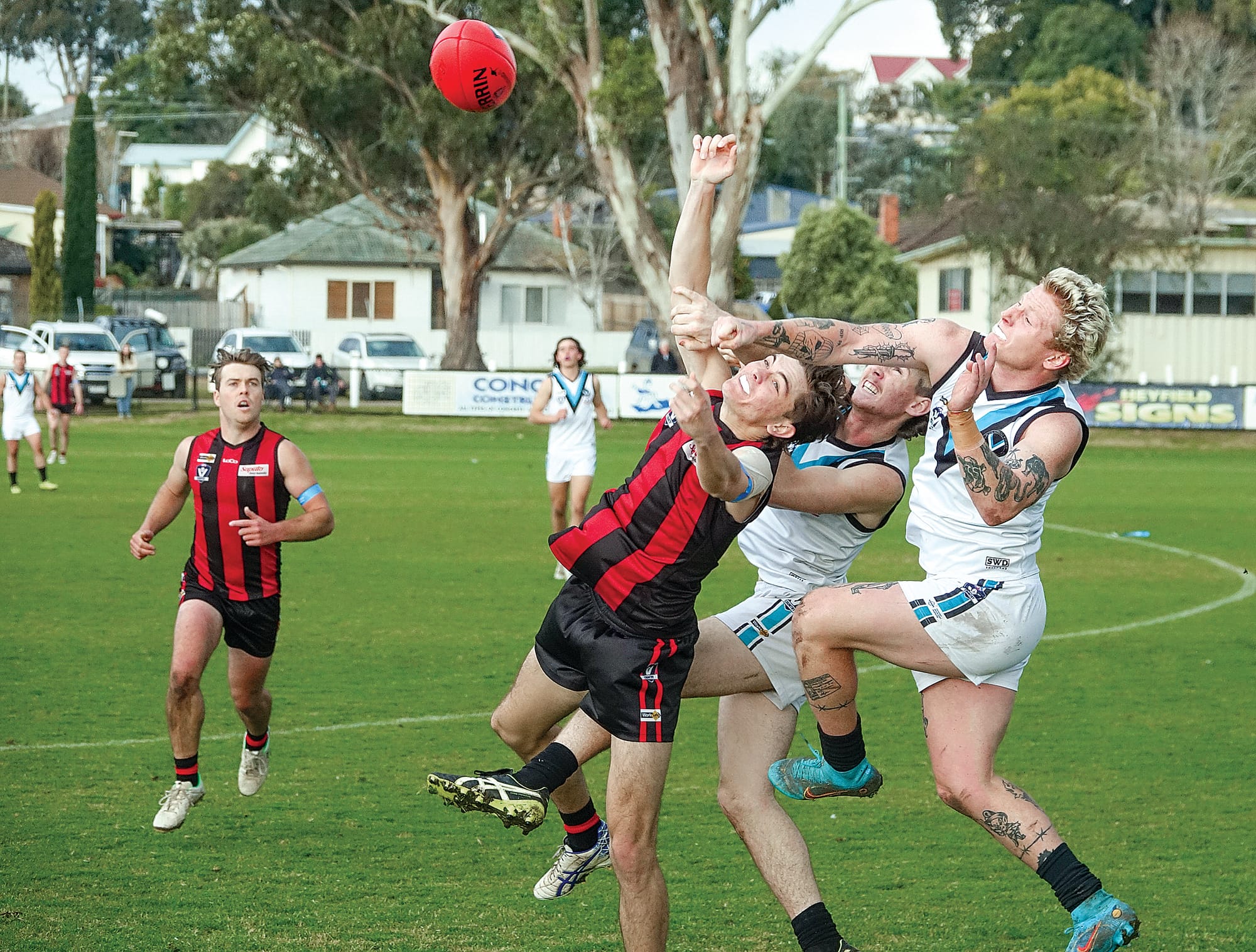 Darcy Brosnan demonstrates the defensive efforts that made the difference for Power in a tough contest at Maffra.