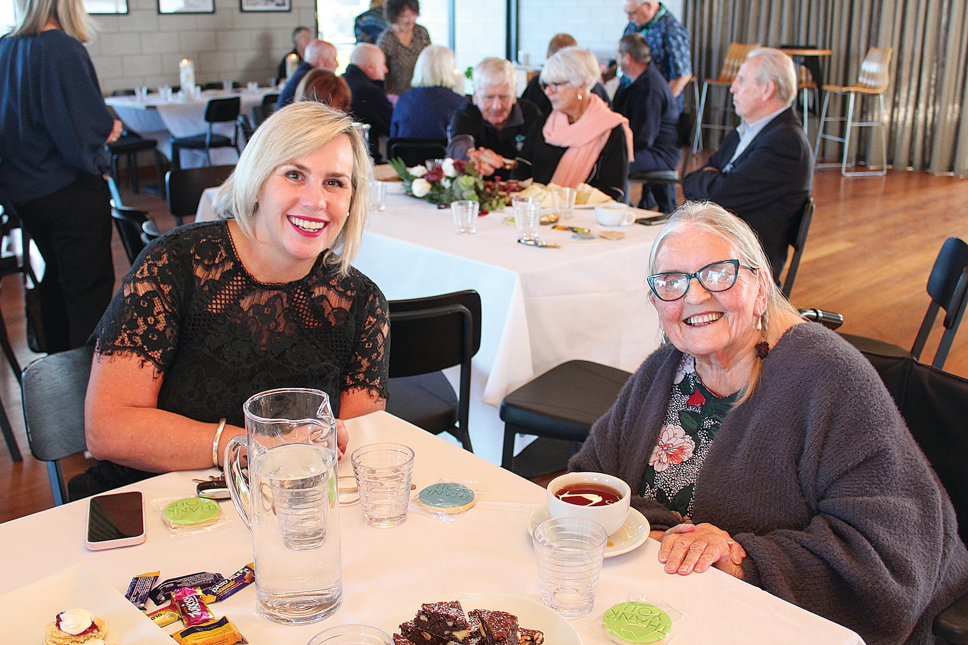 Melissa Stirton of the Bass Coast Health Ladies Auxiliary chats with Armitage House Volunteer Candy Pile.