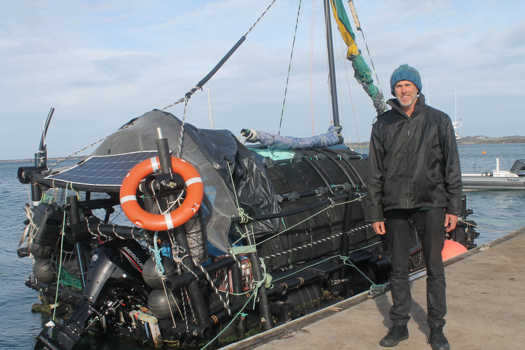 Samuel McLennan moored at Rhyll after crossing Bass Strait from Southern Tasmania in a raft that was built entirely from rubbish. B26_2825
