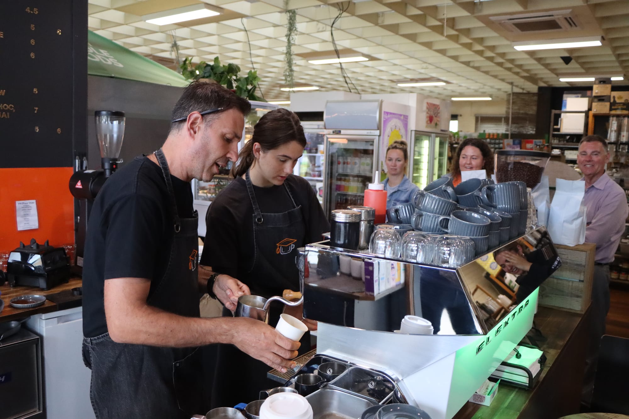 Joe Licciardi and Lisse Bath ensure people can enjoy a coffee despite the lack of town power in Leongatha.