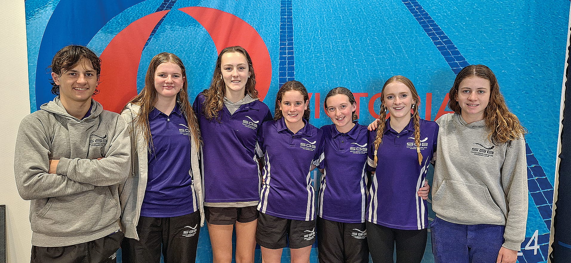 South Gippsland Bass swimmers relaxed post-race at the Victorian Age Championships.