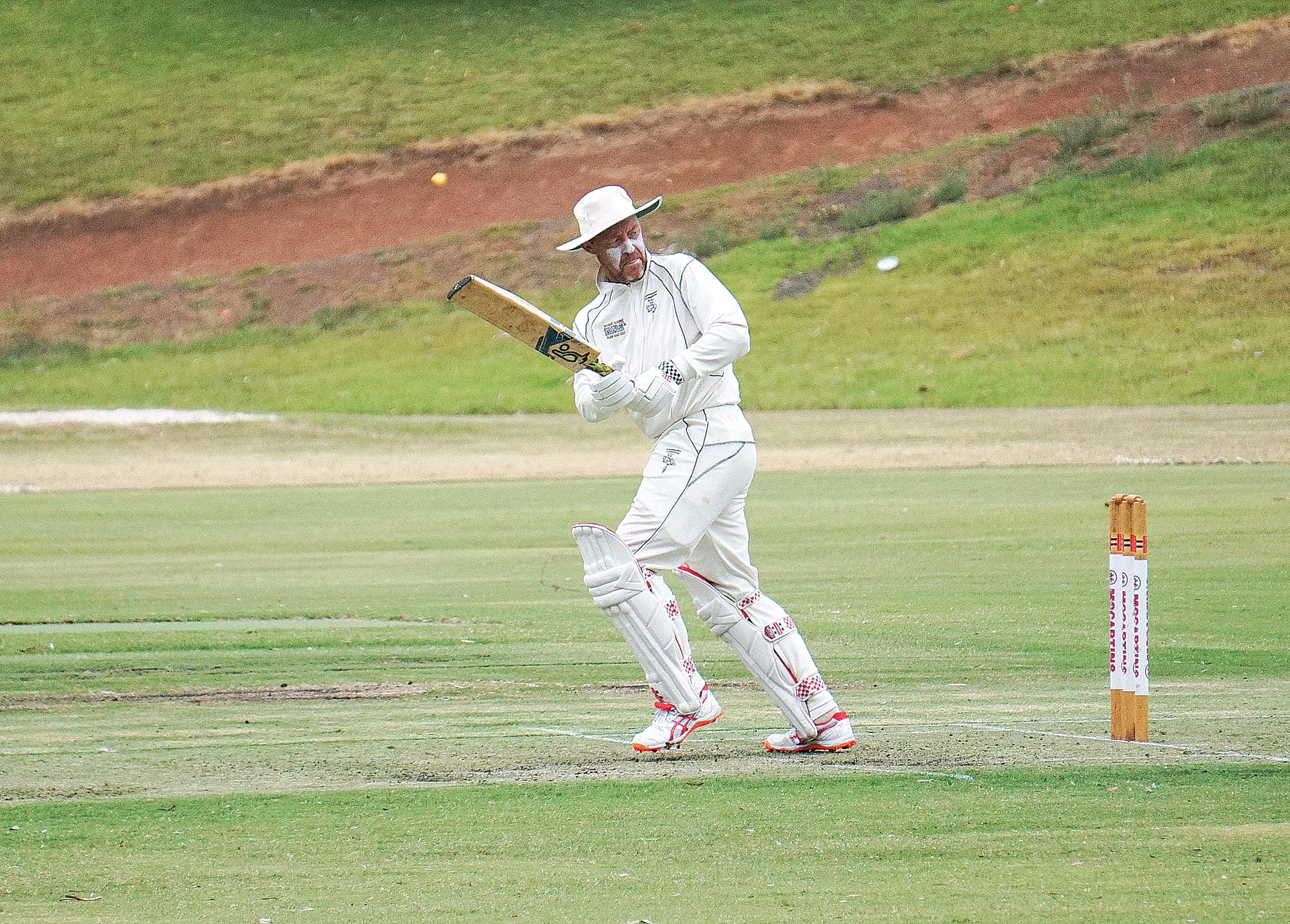 Thomas under pressure whether to make a run or not.