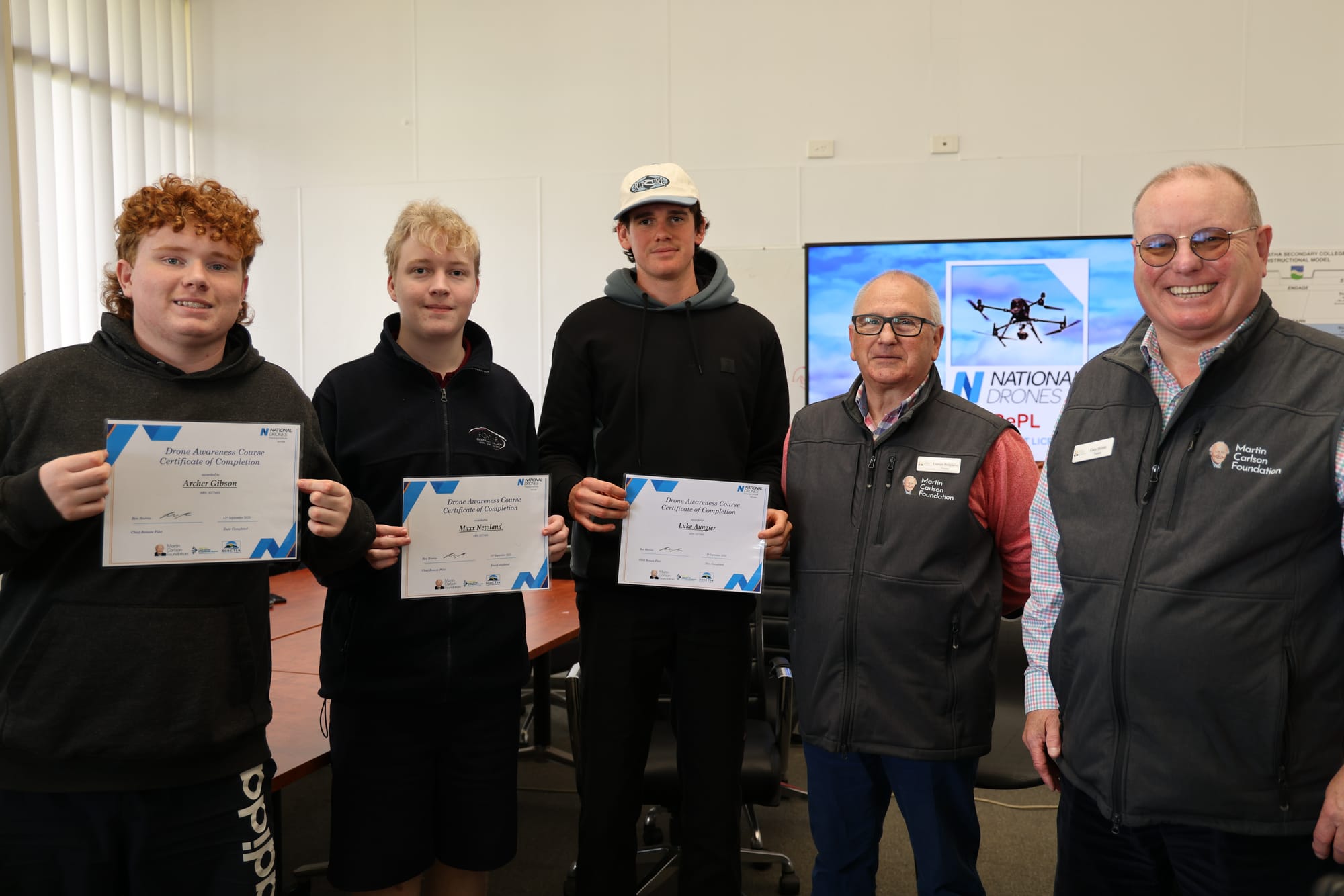 Archer, Maxx and Luke from Leongatha S.C. receiving Drone Awareness Course Certificates from Martin Carlson Foundation Trustees Darren Polglaise and Gary Brittle. B46_3725

