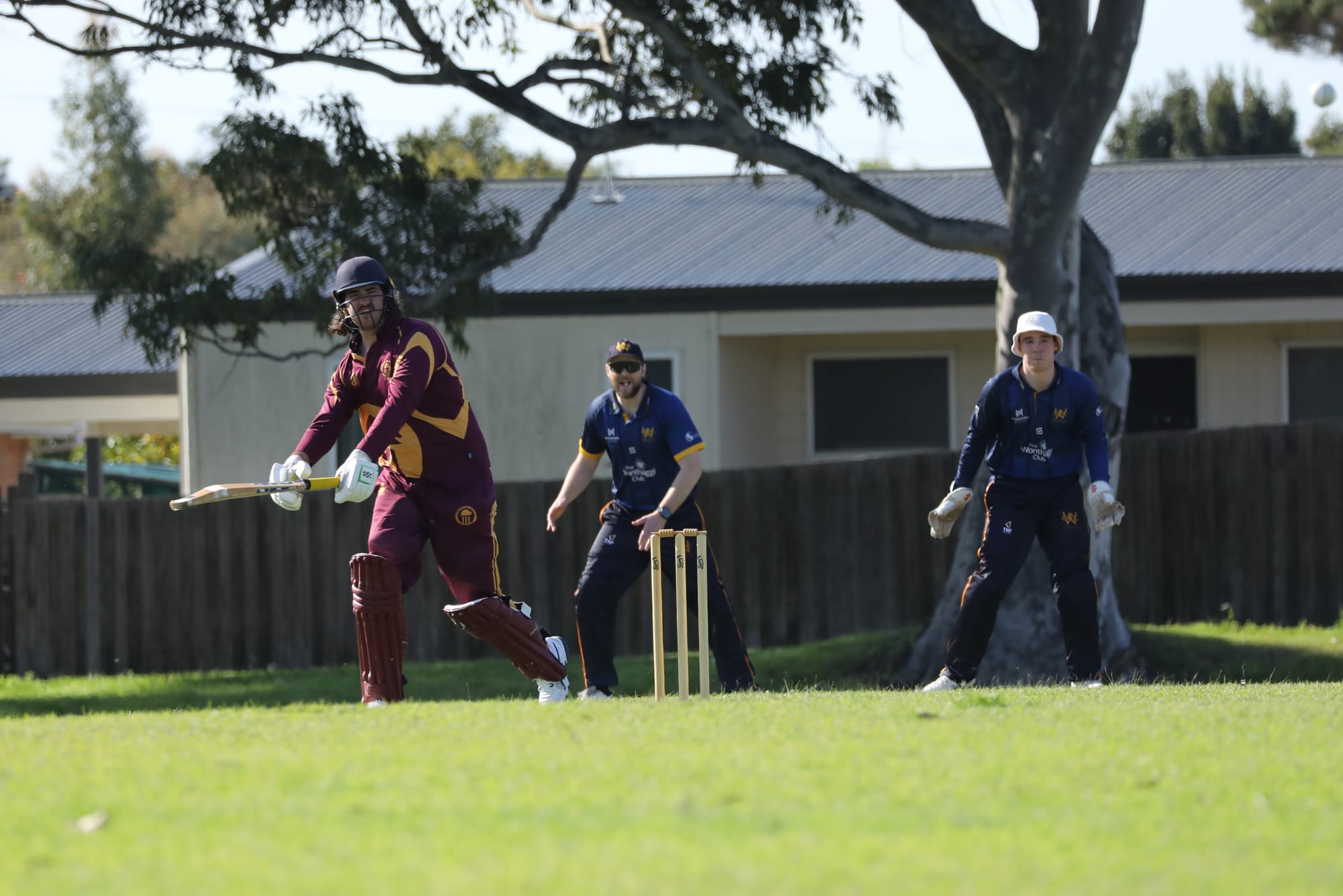 Ethan Lamers watches on as Heath Dobbie goes in for an unsuccessful catch.