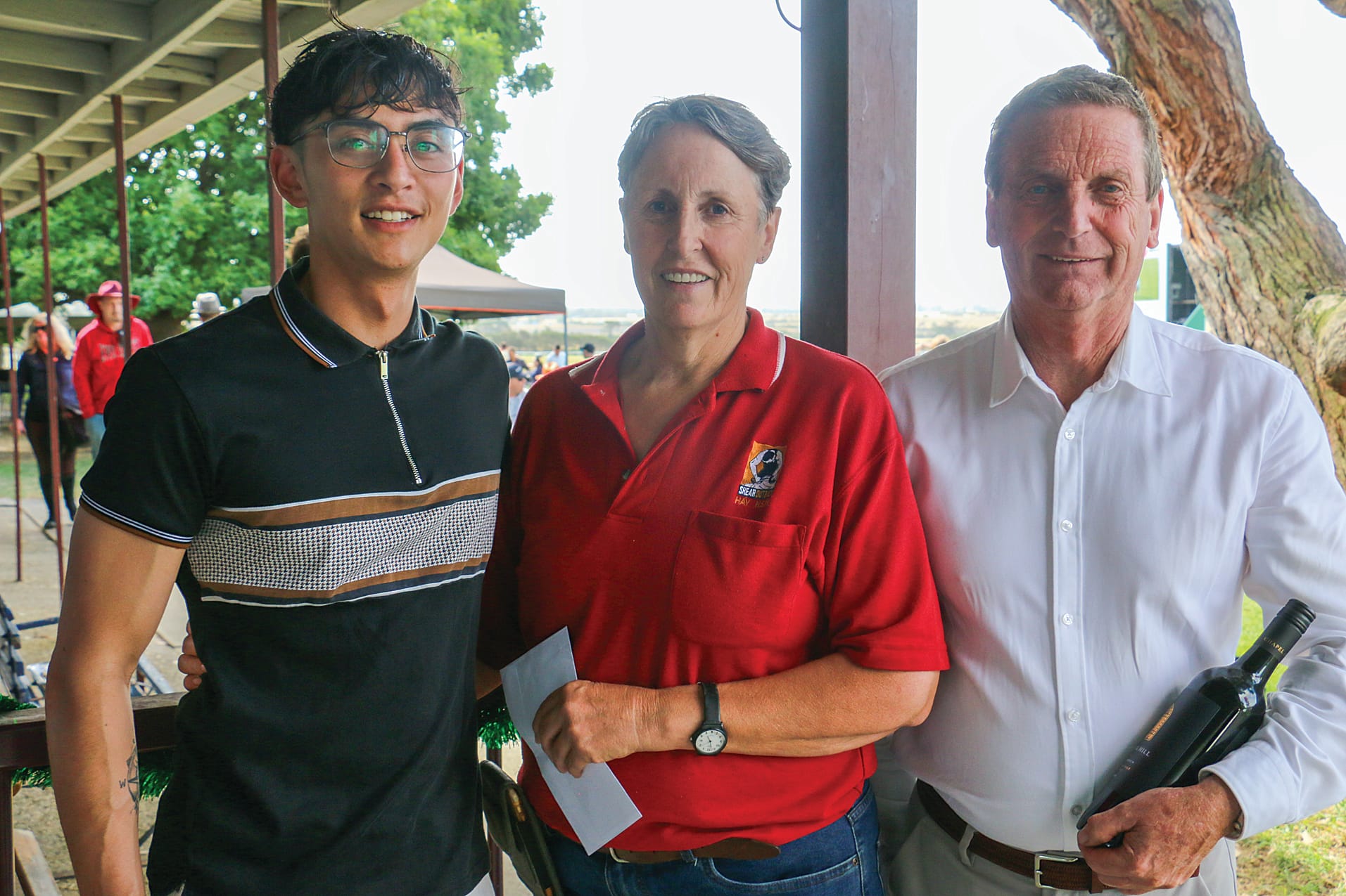 Winning jockey Dylan Dean with owner and trainer Noni Shelton and owner Colin Butler
