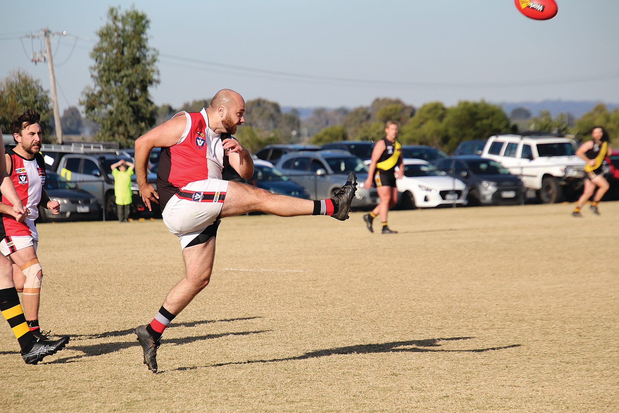 Robert Simpson clears the ball out of defence in the reserves on Saturday.