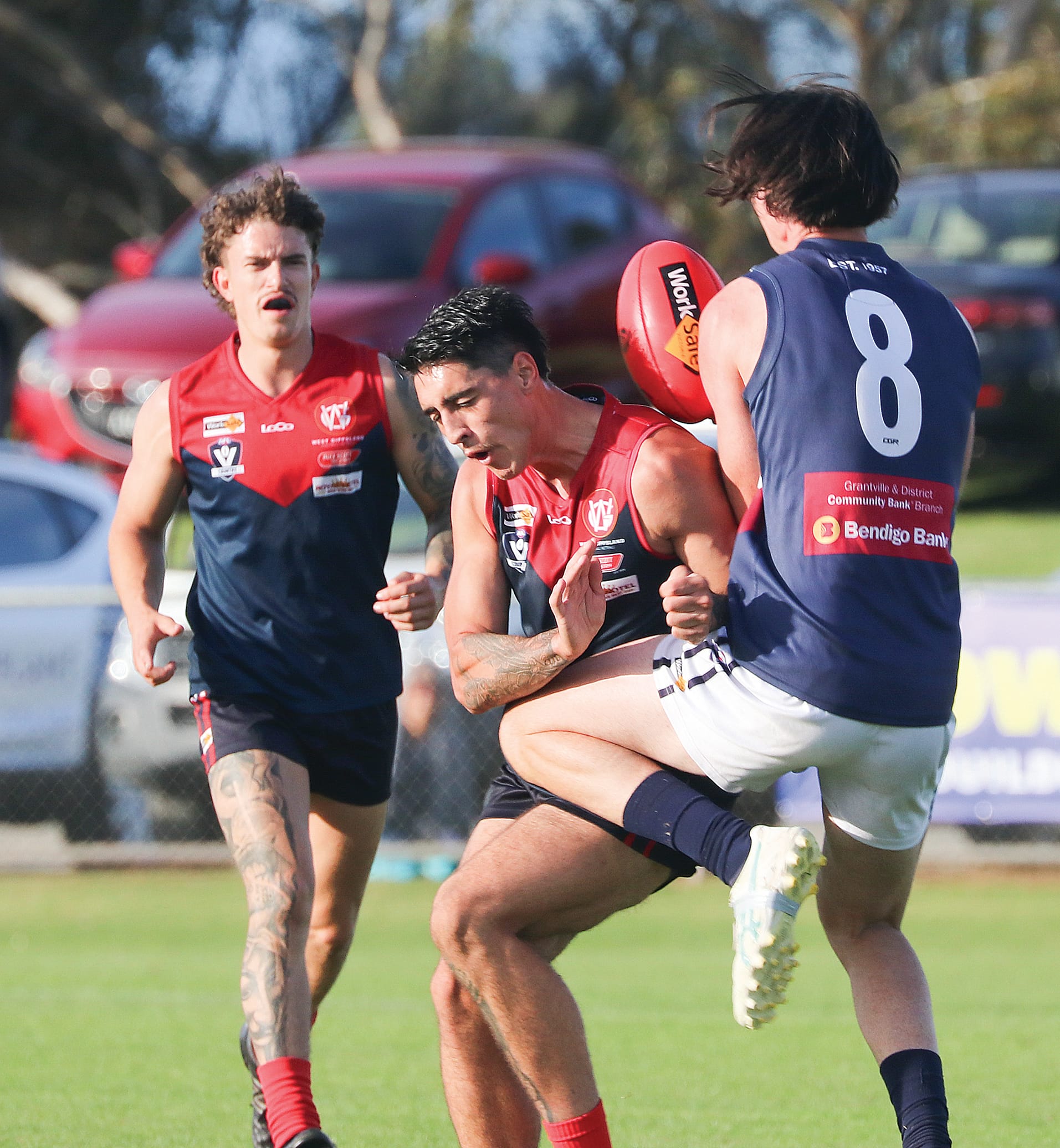 Dean McRae of Kilcunda-Bass goes up against Koo Wee Rups Jordan Sprie. Z40_1924