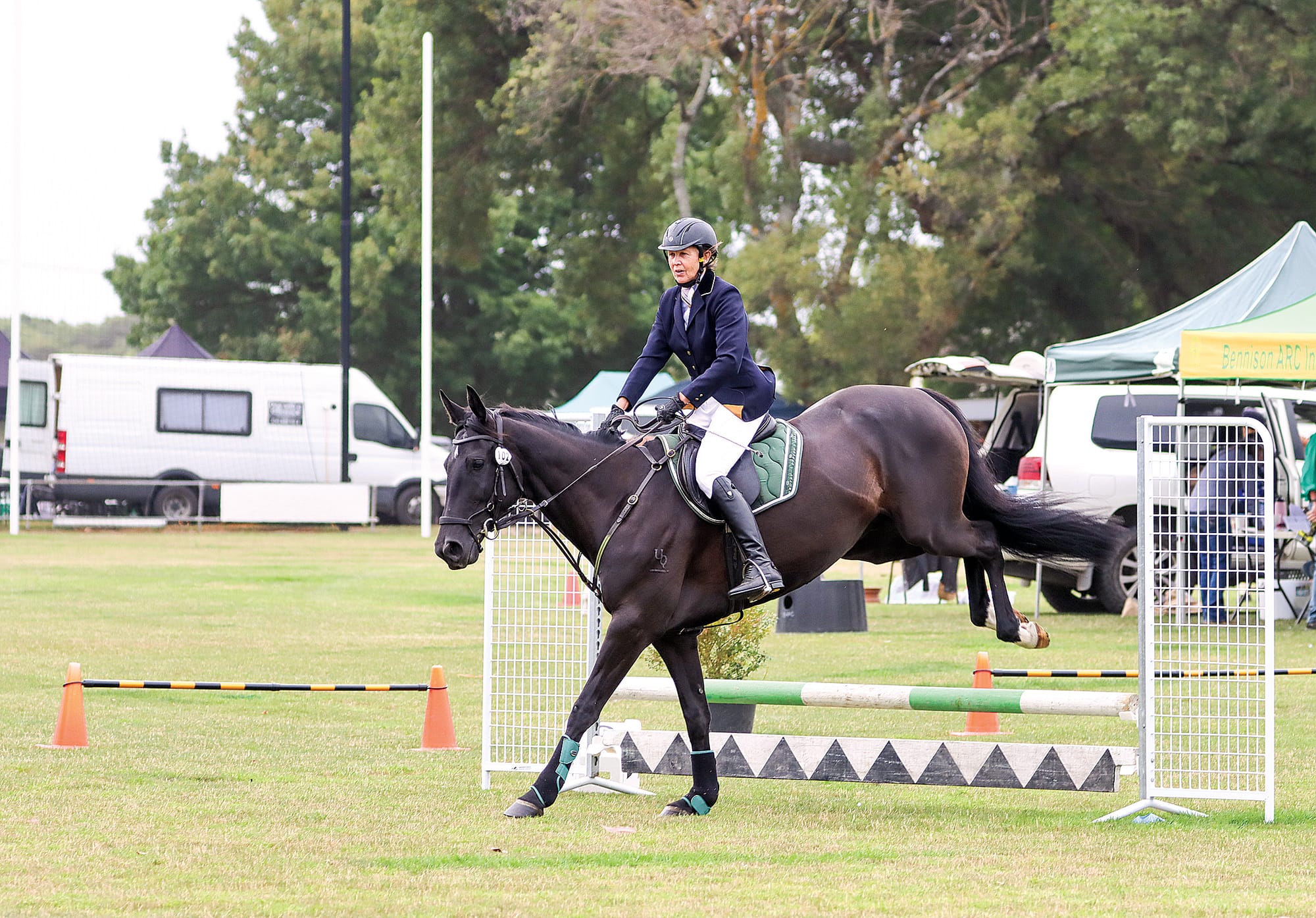 Lloyd clears a jump under the guidance of Yarram’s Yvonne McNeal. A11_0924