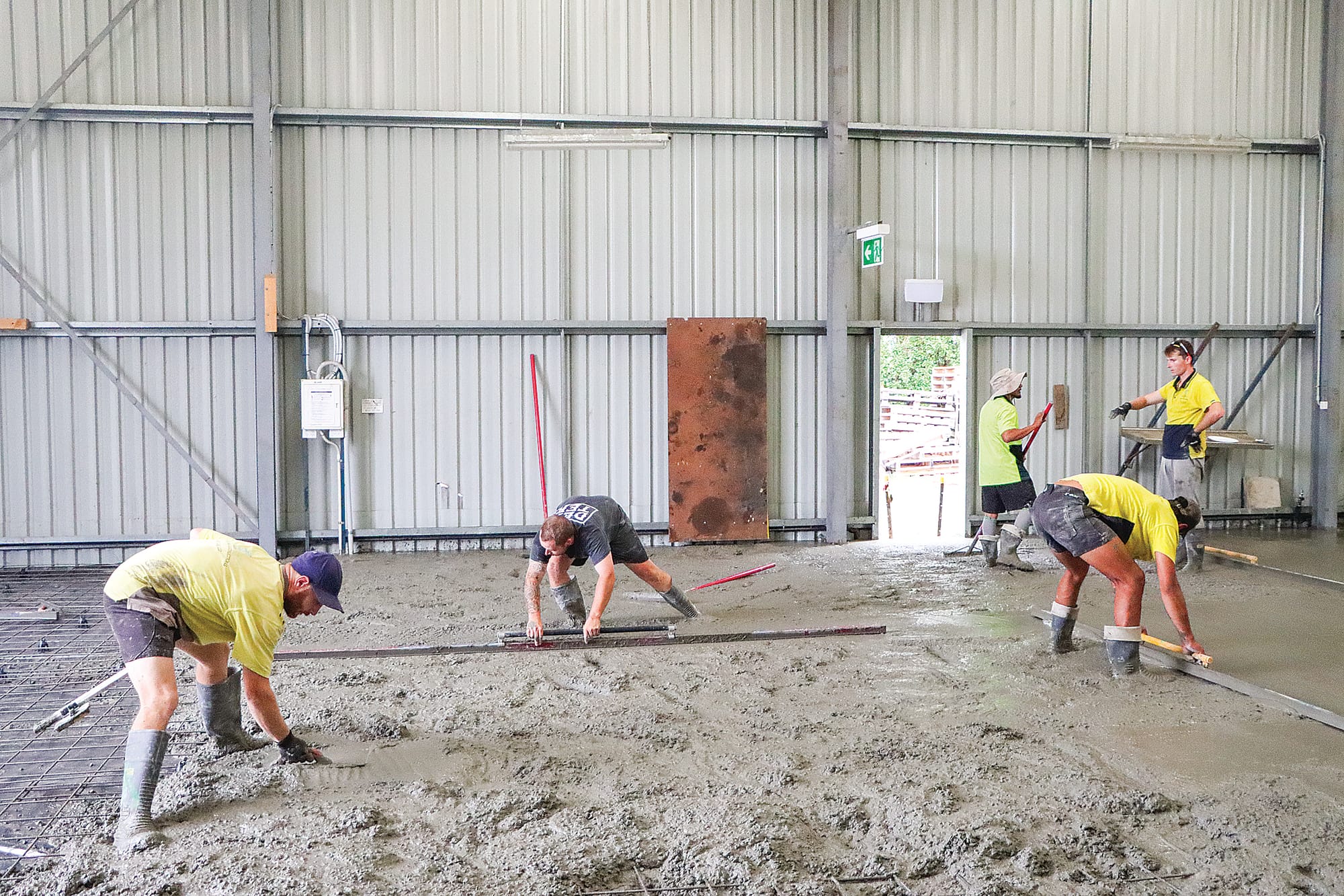 Screeding occurs to level the new Korumburra Men’s Shed floor.
