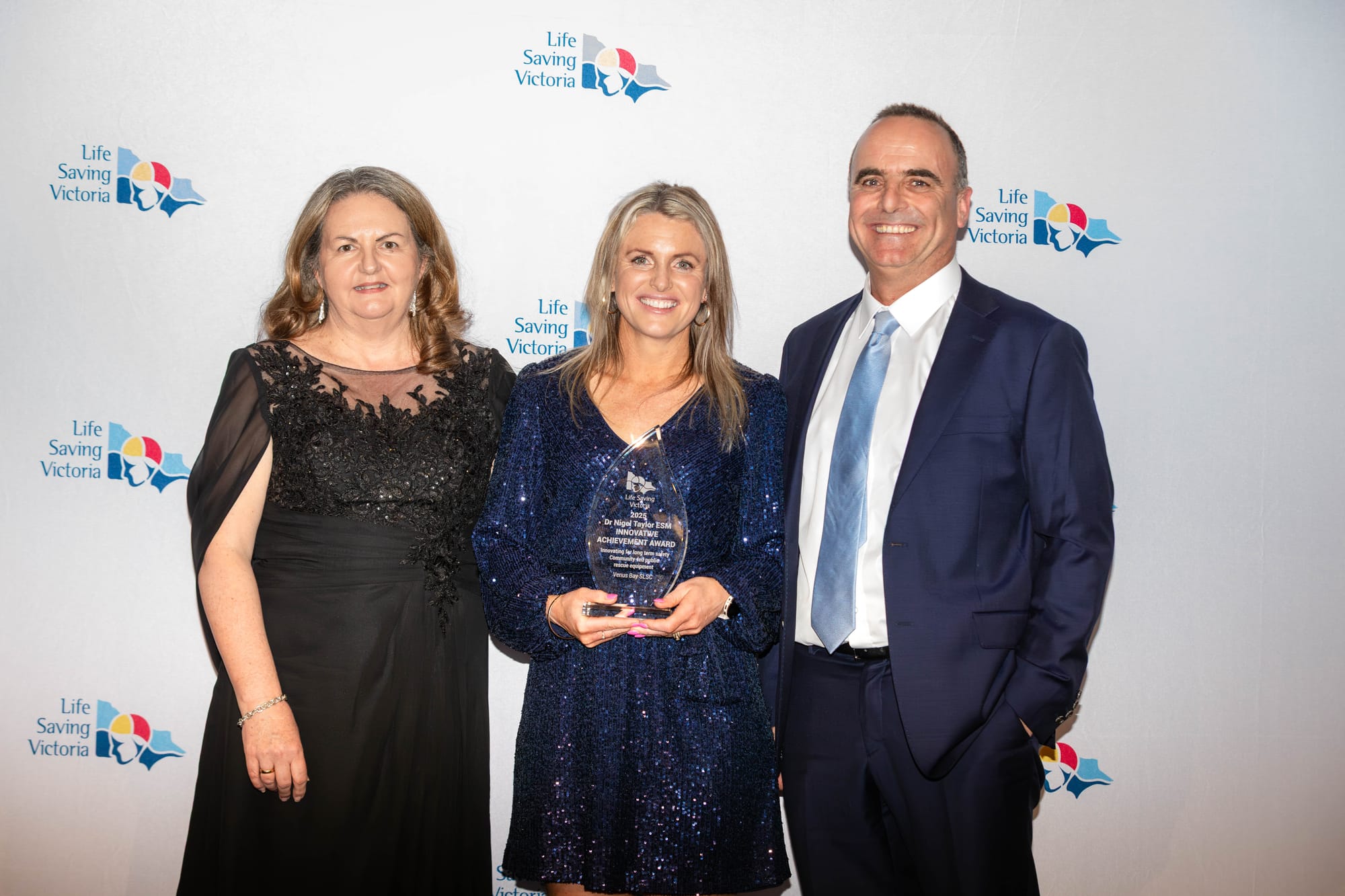 Venus Bay's Kimberley Gee and Paul Hoffman with the Innovation Award and current LSV President Susan Wolff.