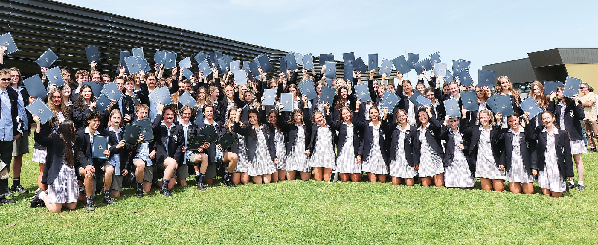 Newhaven College class of 2022 Year 12 graduates receive their valedictory certificates and academic awards at the formal graduation assembly. Z01_4223