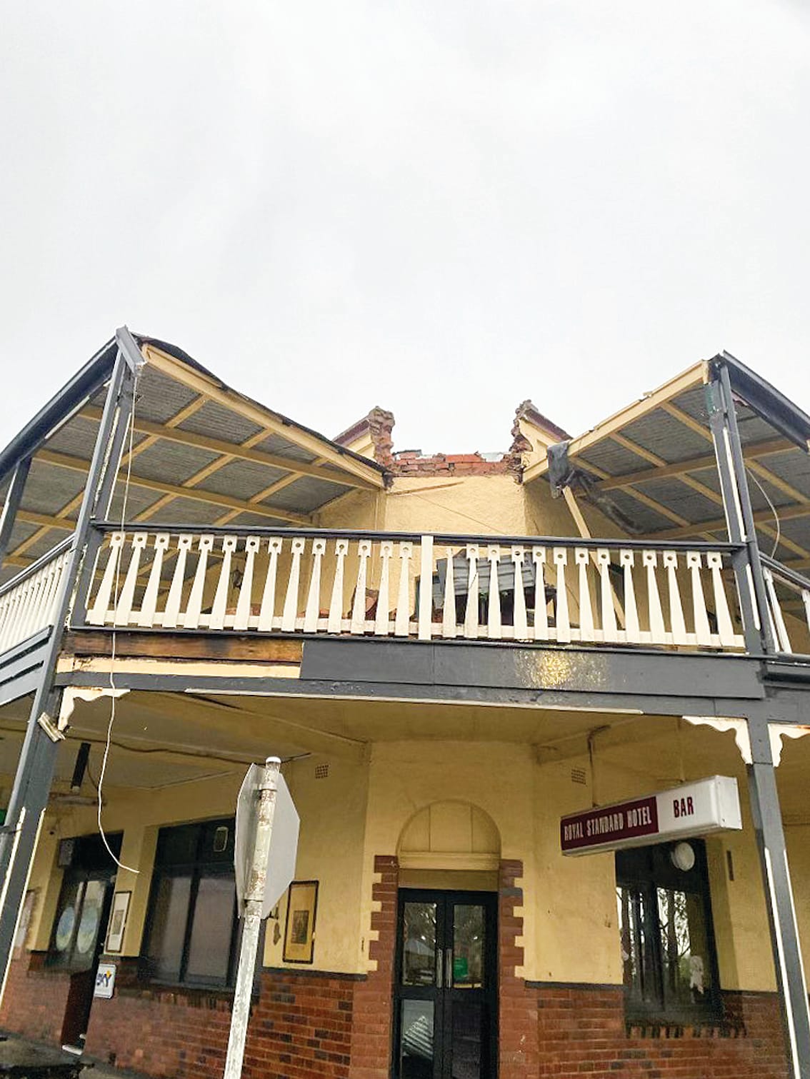 At the height of Monday morning’s storm, part of the front verandah of the historic Royal Standard Hotel at Toora blew off.