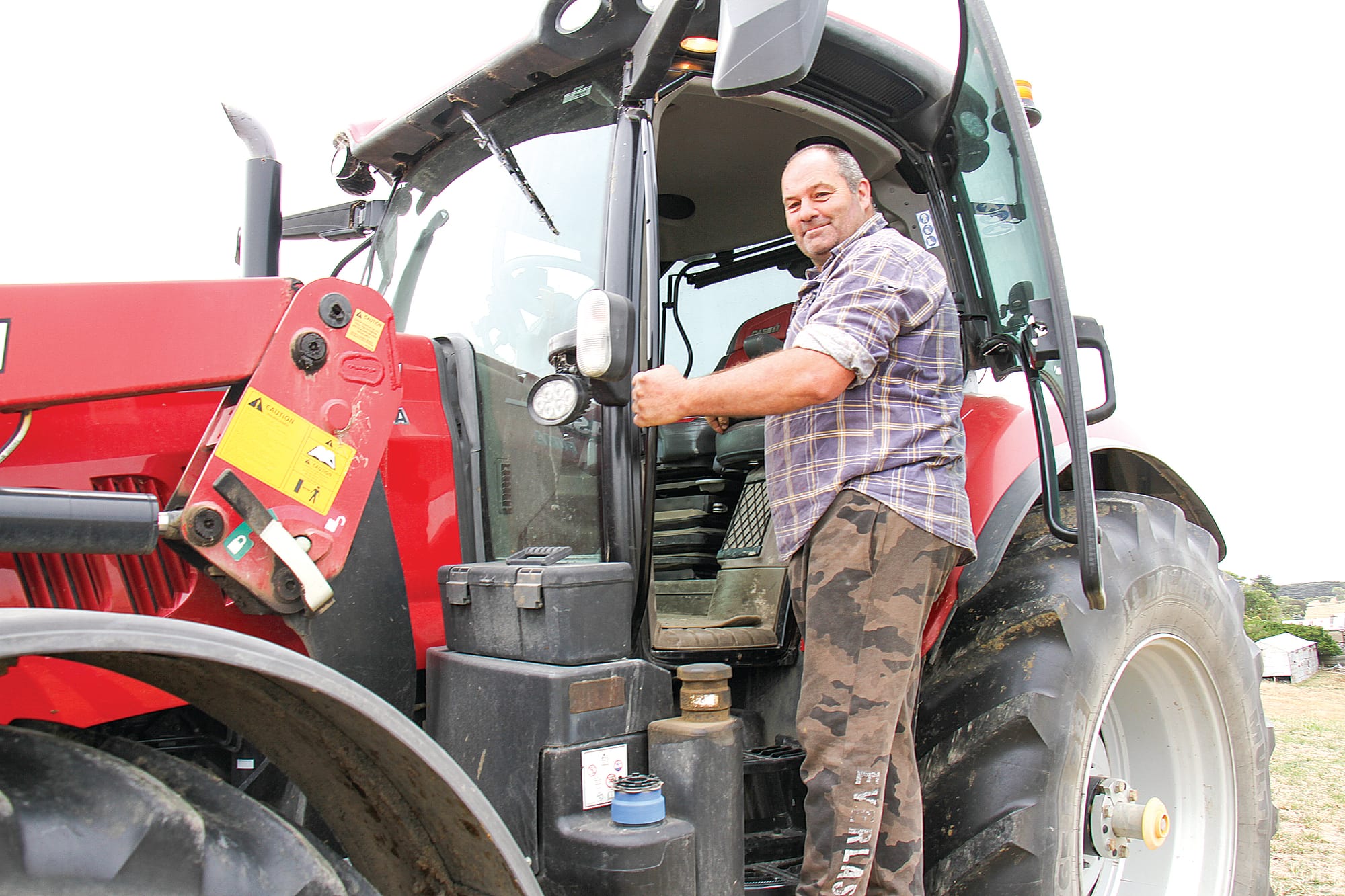 Woolamai farmer Paul Kent prepares to load hay destined for South Australia. B09_0425