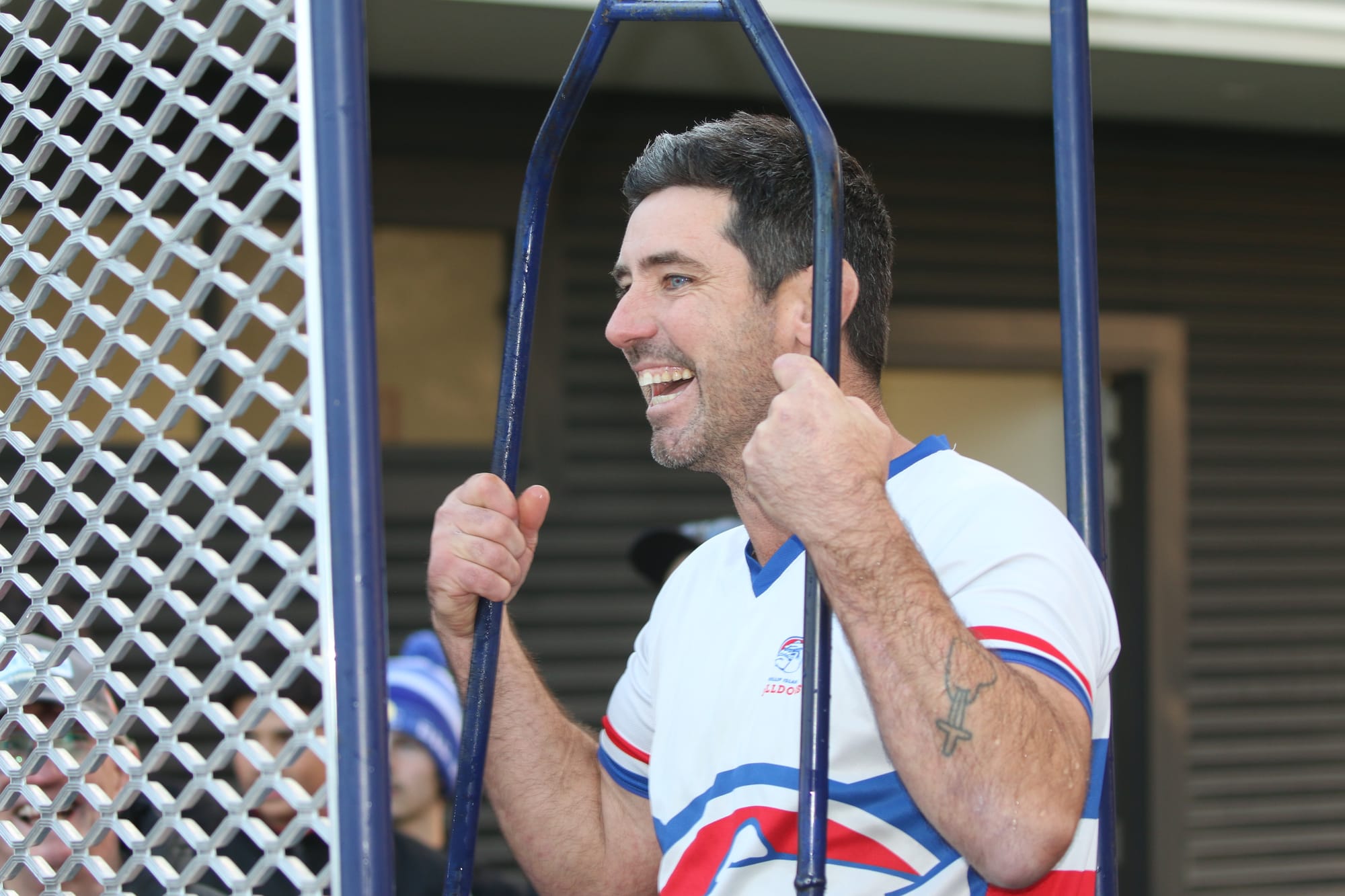 Damien Holmes takes the plunge for MND at Dalyston Football Netball Club. 