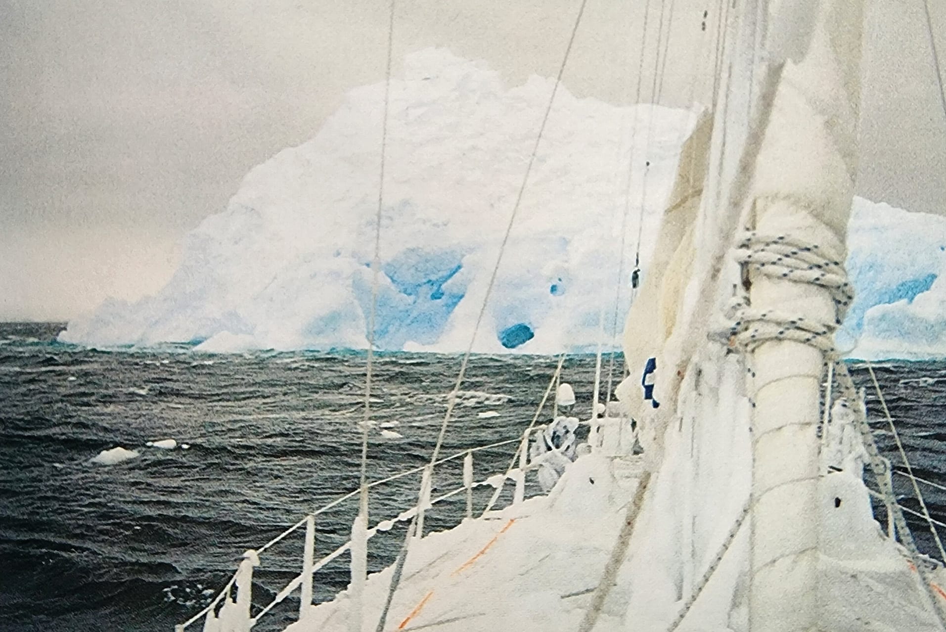 Edging Spirit of Sydney beneath the shelter of an iceberg on Commonwealth Bay, shortly before Peter’s dive over the side to cut a rope tangled in the propeller.