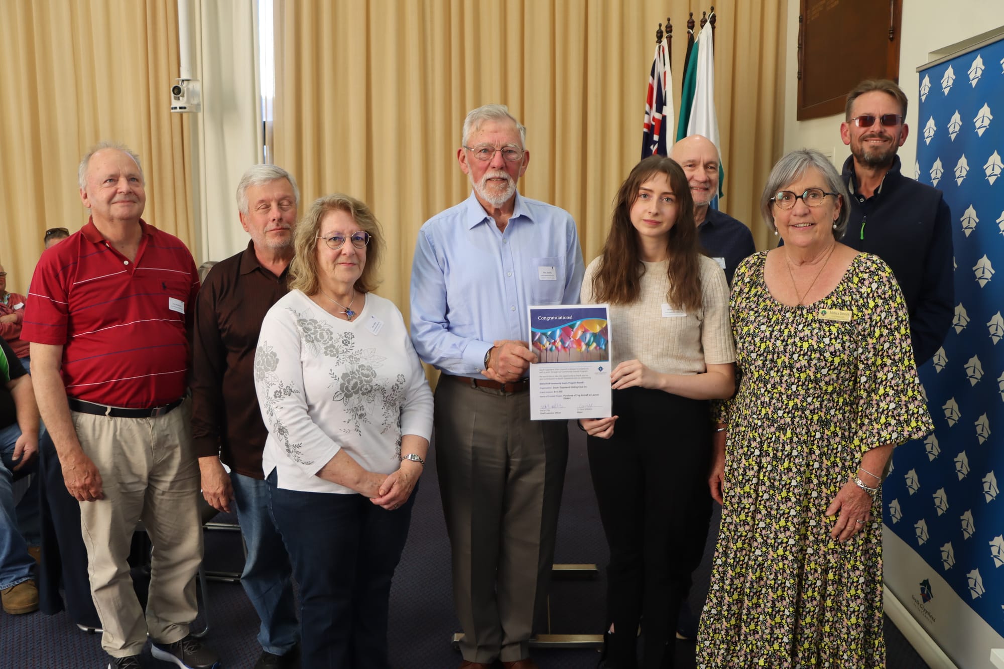 Ray Wakefield, Mark and Bev Alden, Max Speedy, Kristen Muir, Geoff Speedy and Alan Tough of South Gippsland Gliding Club with Cr Mohya Davies.