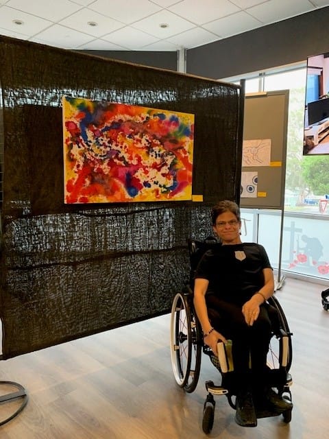 Laura Welsh with her art work My Life