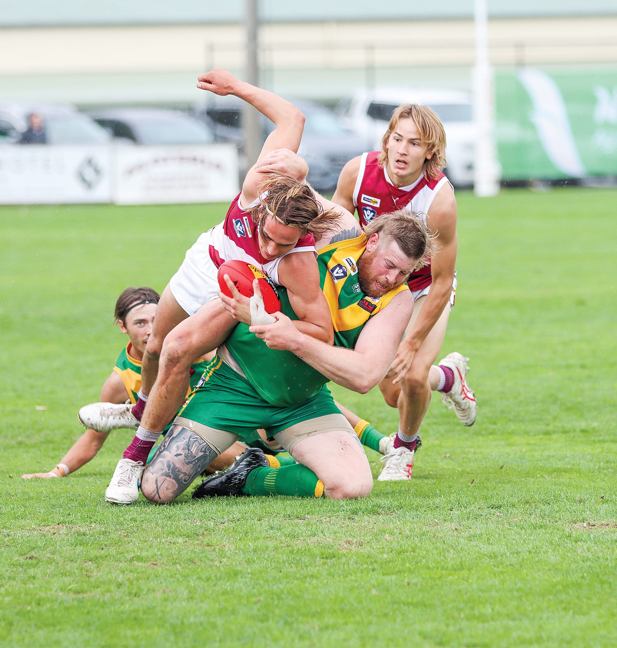 Leongatha’s Ben Willis tackles Traralgon’s Tom Hamilton. A07_1524