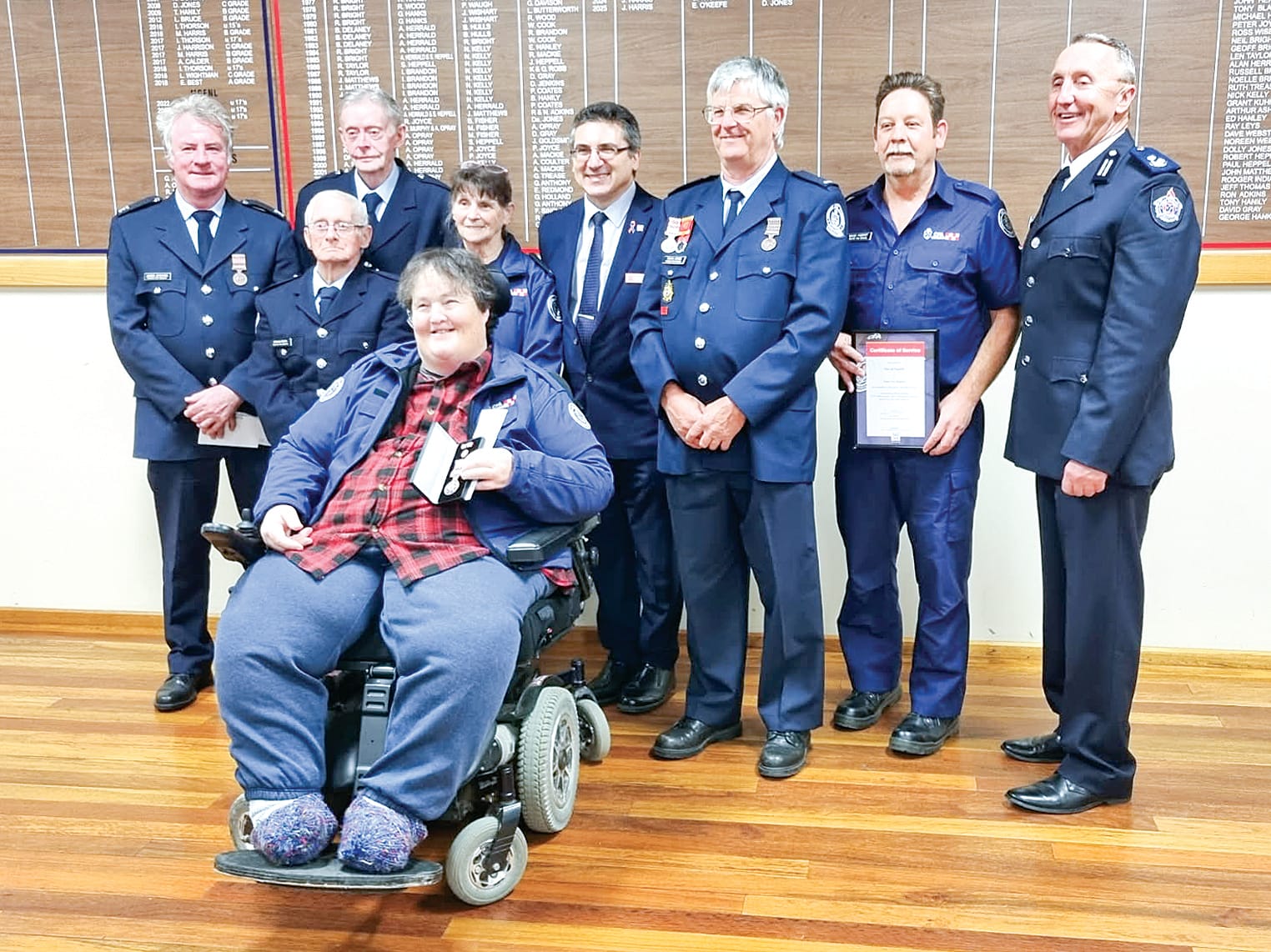 A large contingent of Foster members were presented with their service awards, they included, from left, James McIntyre (30 years), John McKay (15 years), Ron Fisher (50 years), Lorinda Gardiner (10 years), second from left, David Footitt (5 years), and front, Paula Crossley (40 years), with CFO Sam Costanzo, Captain David Jones and Commander Andrew McCartney.