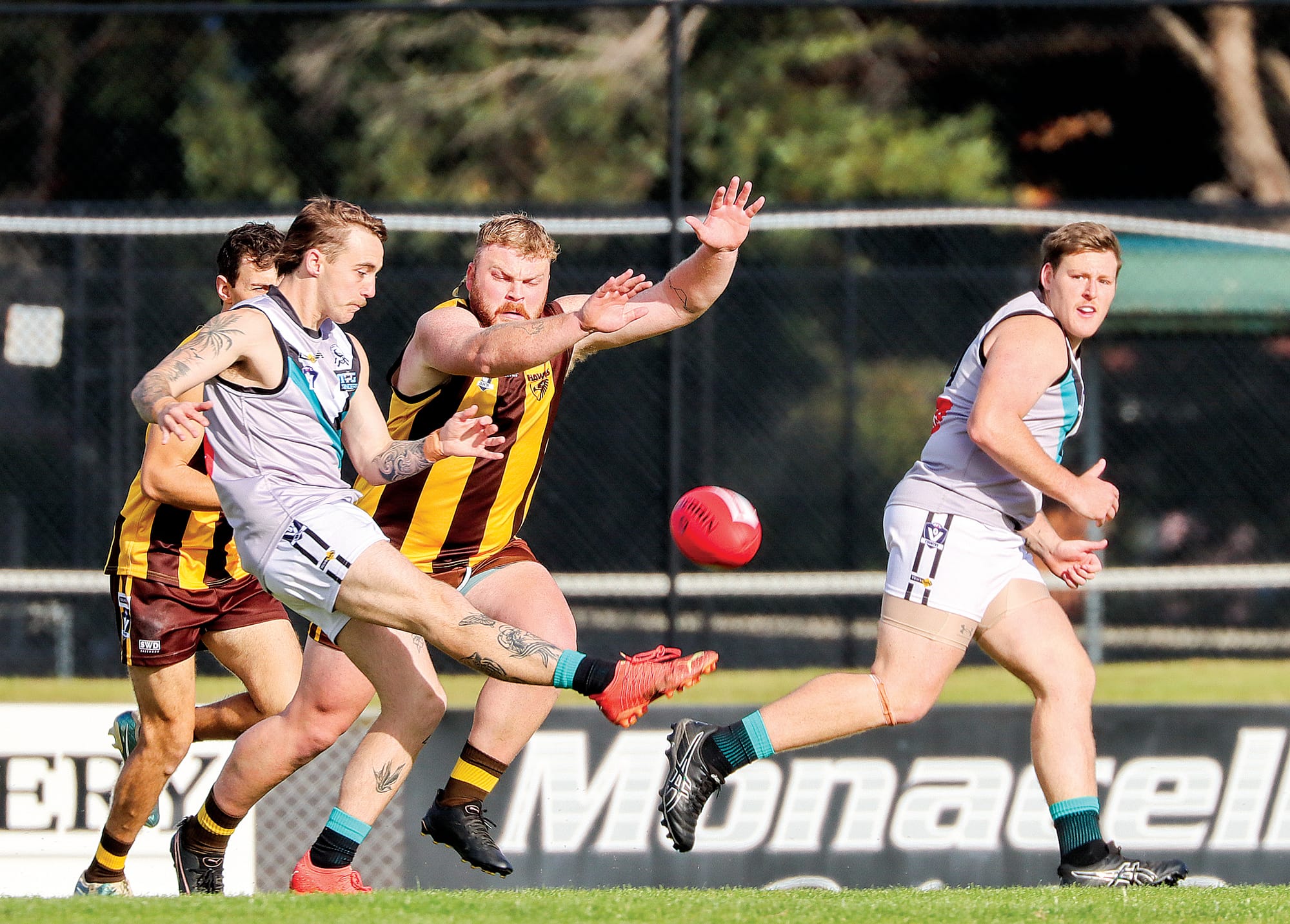 Ben Wemyss gets his kick away under pressure, being one of the better players for Toora in its victory over Morwell East. A26_2125