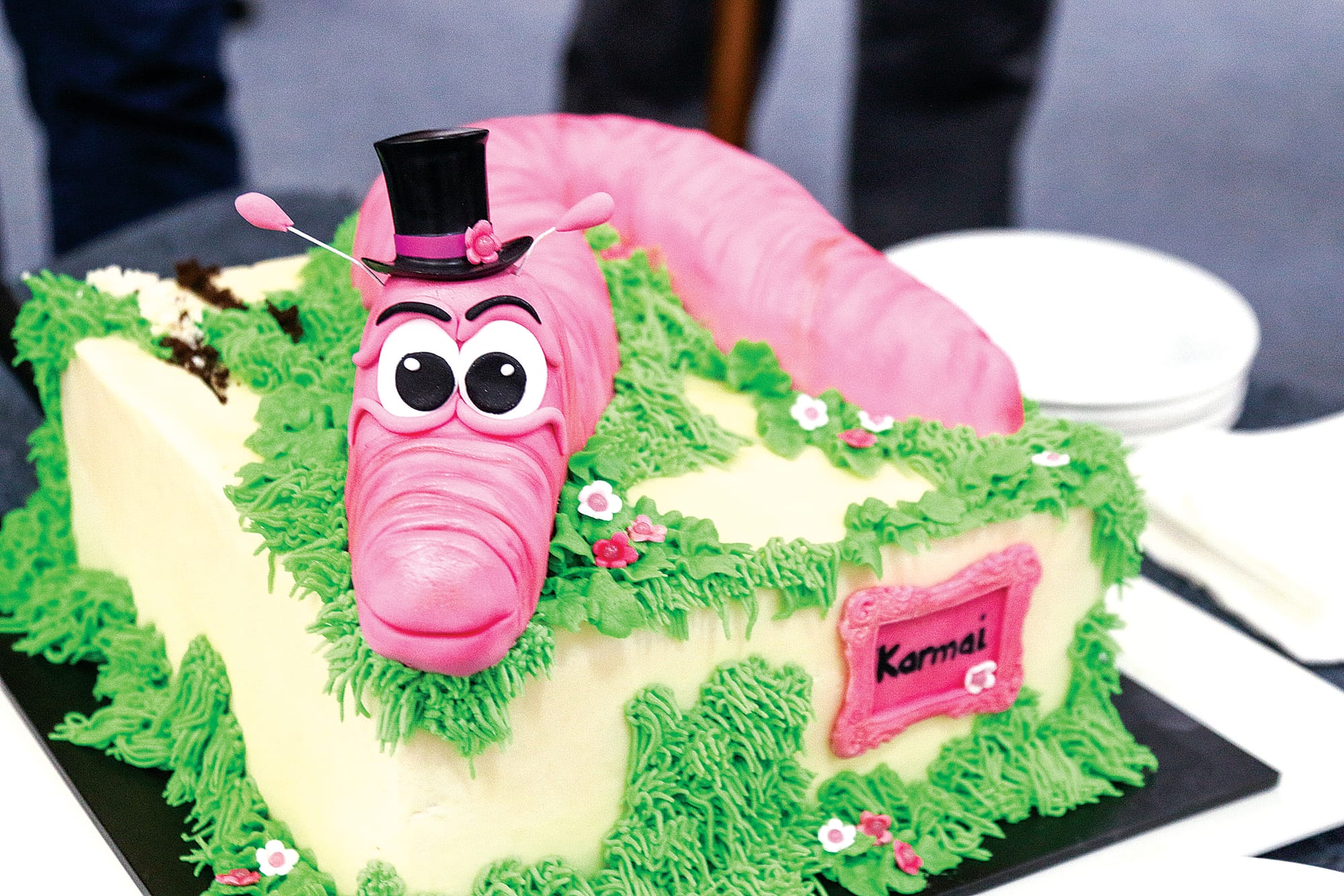A spectacular Karmai cake was created for the opening night of the exhibition centred on the famous giant earthworm.