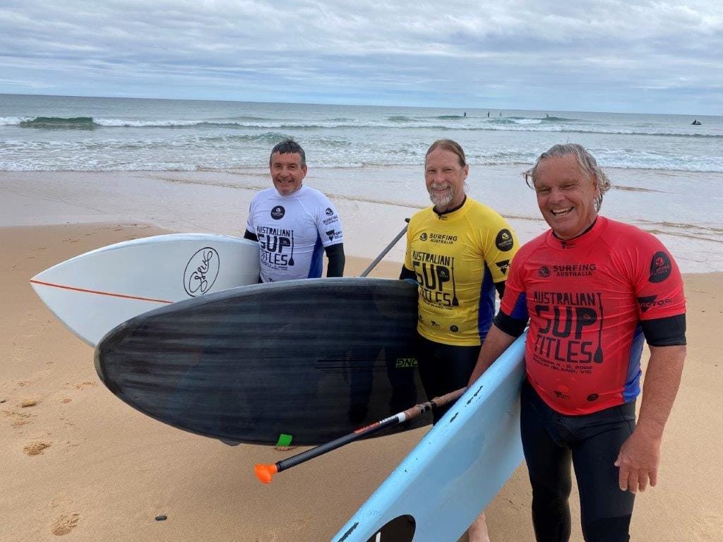 After their heat of the SUP Open Surf event in the Australian SUP Titles at Woolamai this week were. from left, Damien Quinlan of Melbourne, Brook Ekers Perth and John Takle of Jan Juc.