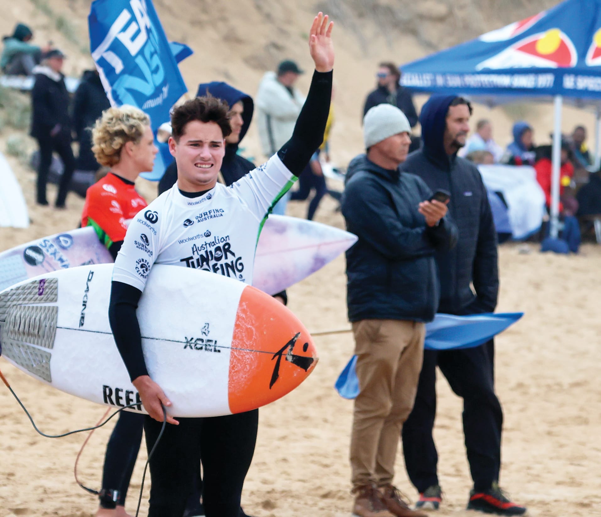 Jesse Siedmiogrodzki of WA calls to his team mate in Under 19 schools all-star teams event at the 2023 Woolworths Australian Junior Surfing Titles on Phillip Island at the weekend.