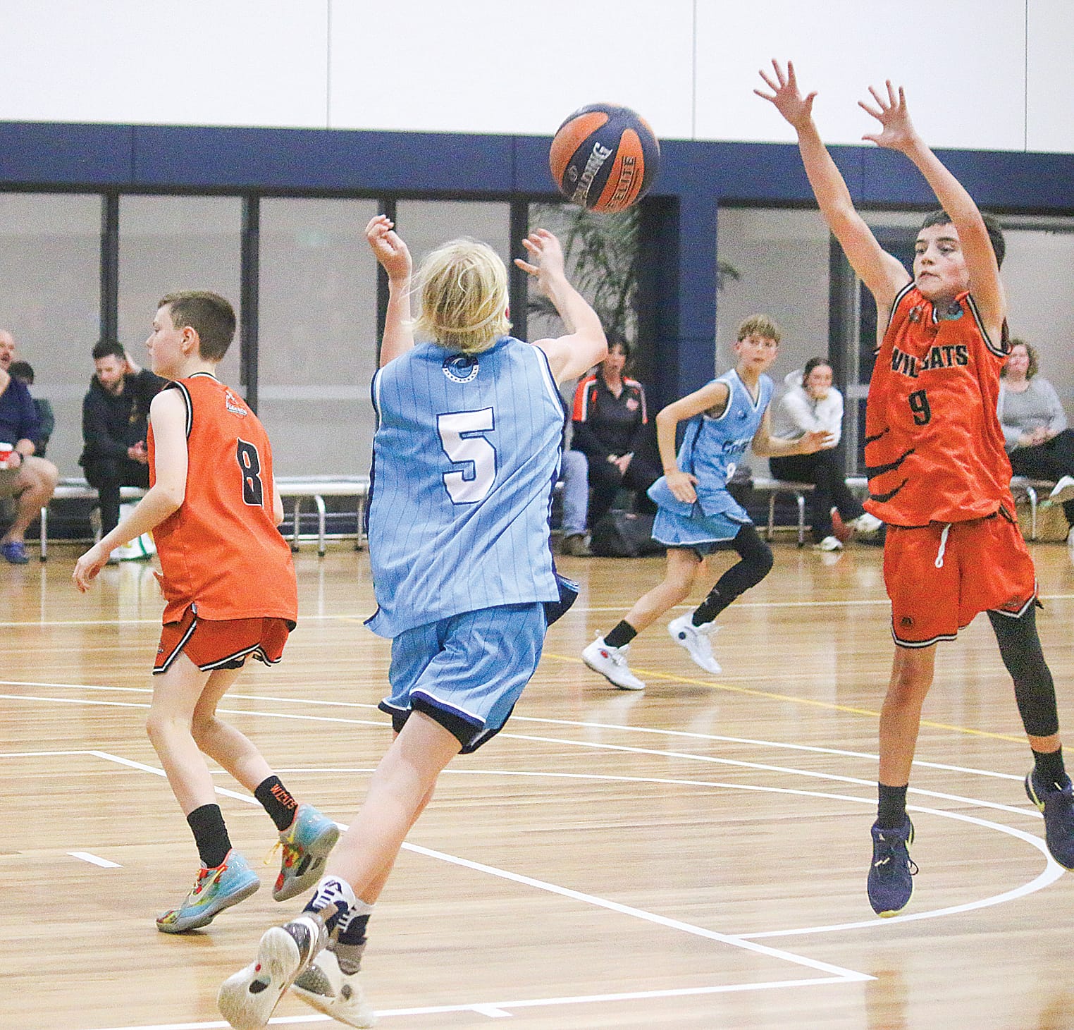Heinrich Nellen puts up a good defence against Wonthaggi’s Cruz Hill but ultimately were no match for them on the day in the U14s Boys A. ob16_4324
