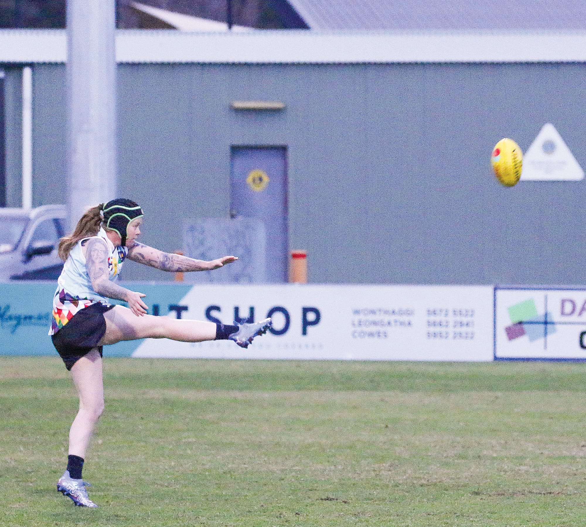 Tayla Stahl boots it towards Breakers goals.