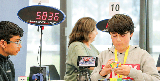Racing to solve a Rubik’s cube