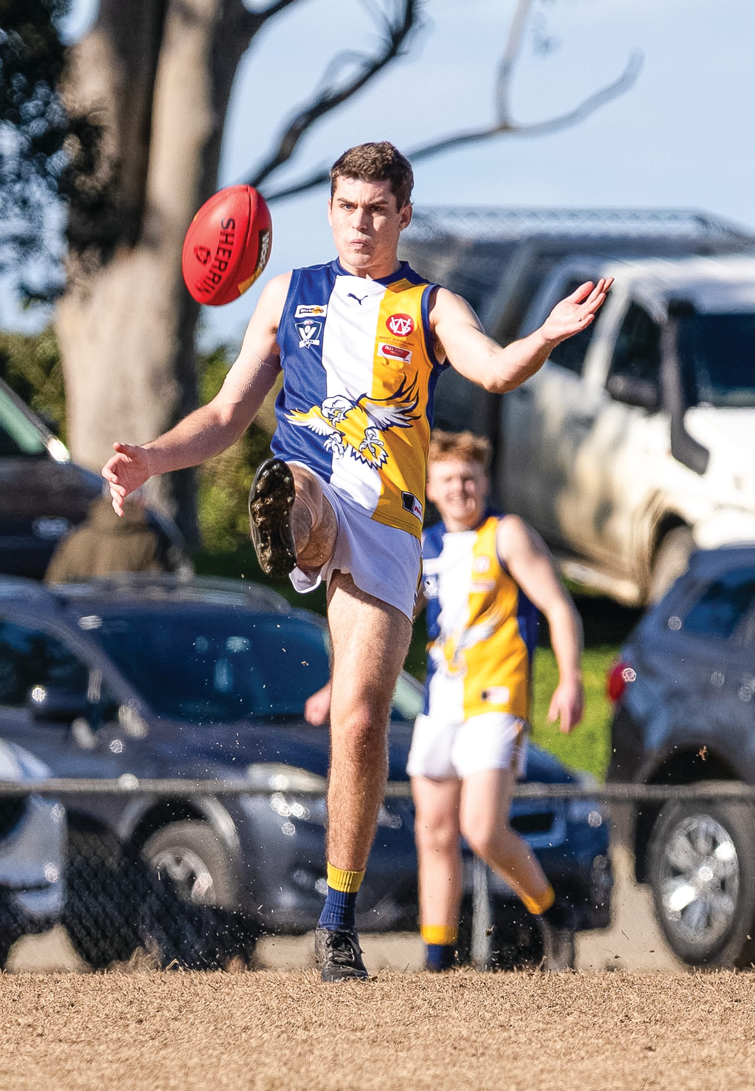 Harry Butcher boots it downfield. 