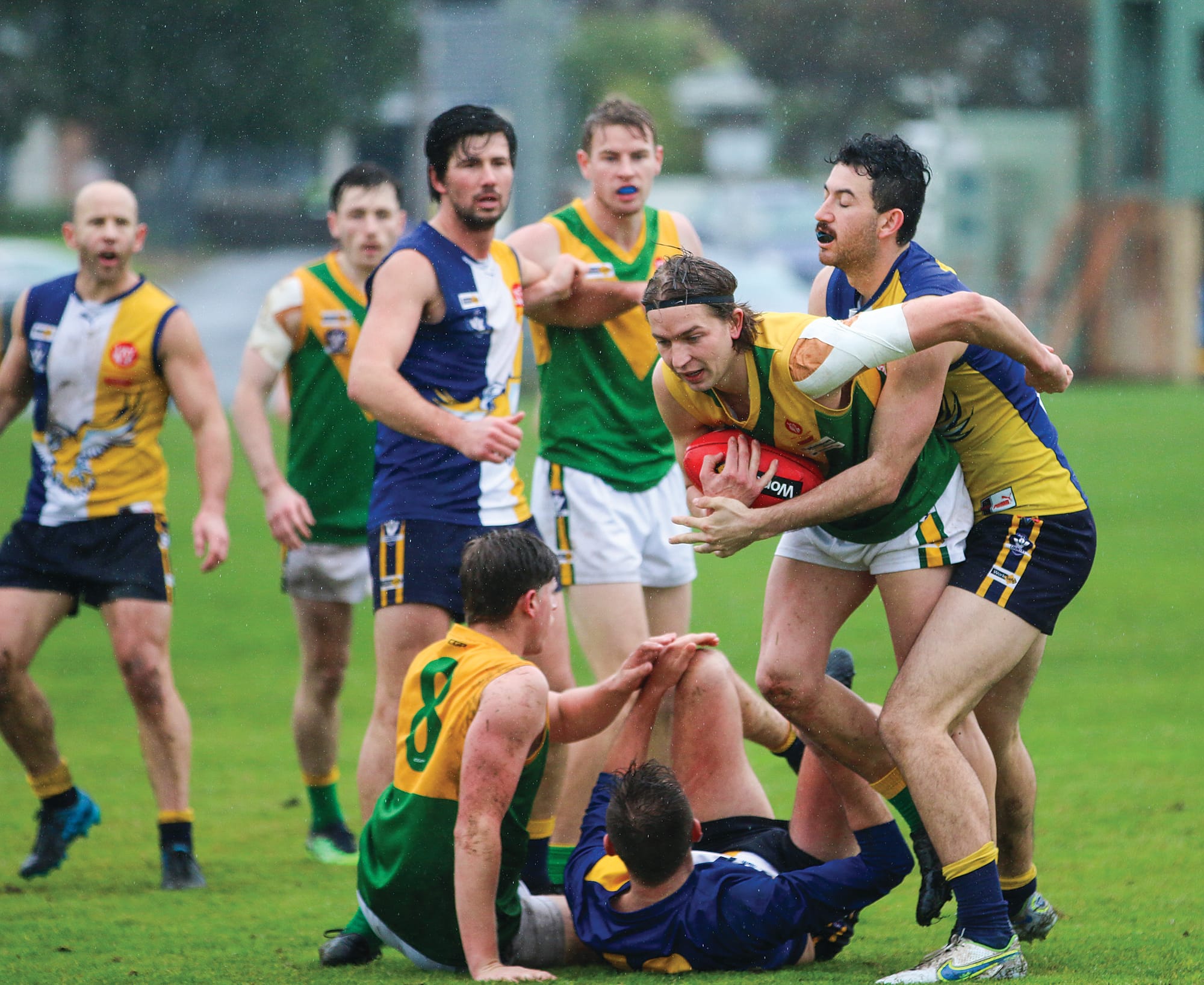 Inverloch-Kongwak’s Oscar Toussaint goes into battle with his Garfield opponent.