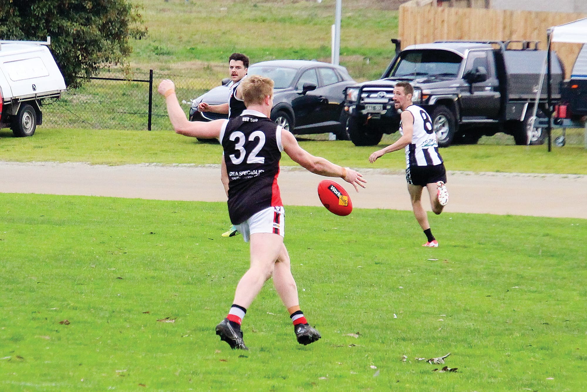 Nyora’s Will McGindle keeps the ball moving in the Seniors match against Poowong.

