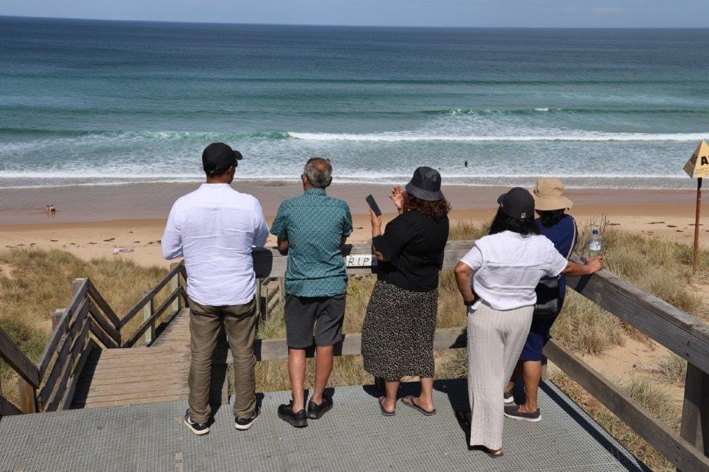 Visitors take in the spectacular view over Forrest Caves Beach at the weekend oblivious of the tragedy that occurred their little more than a month ago.