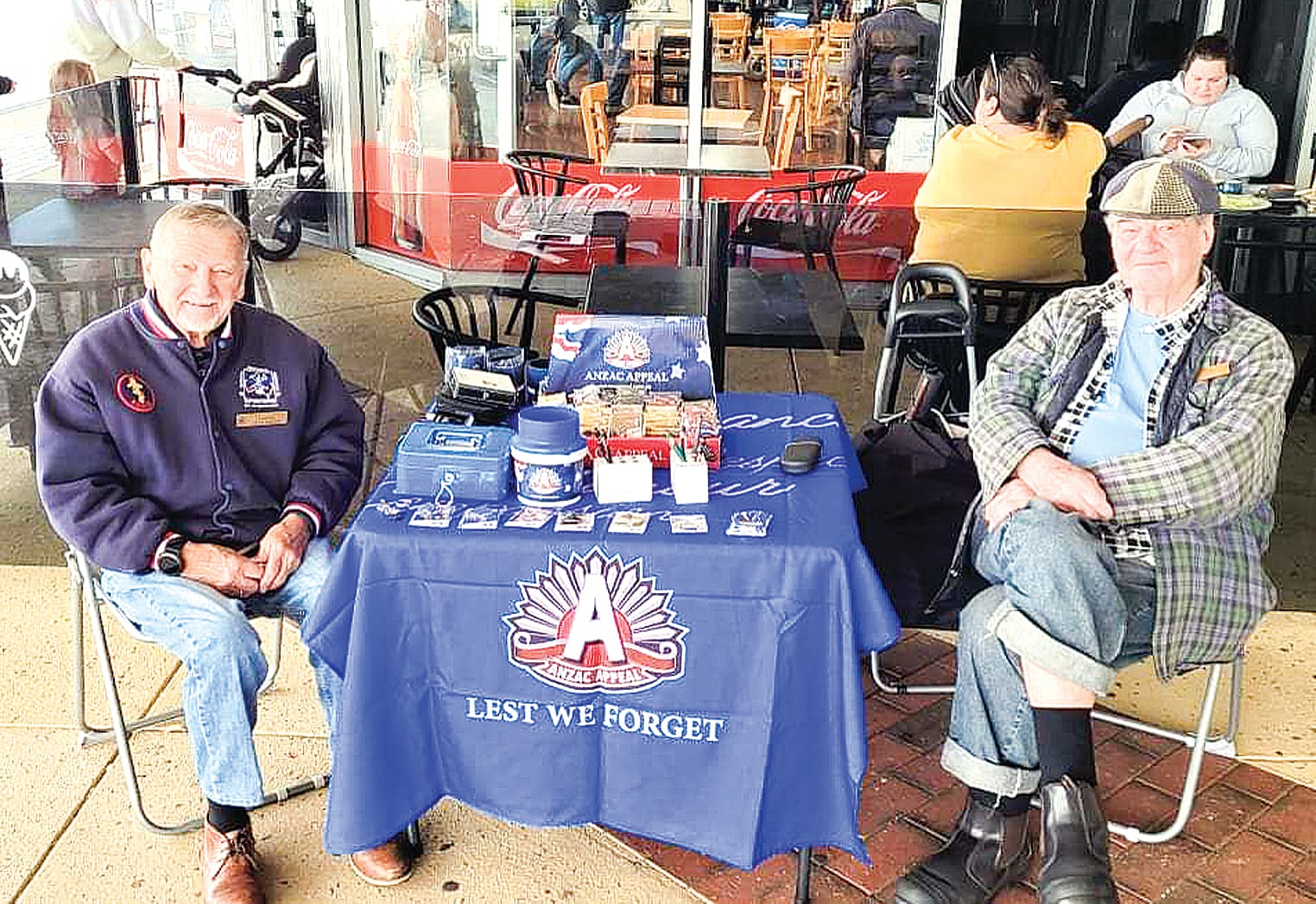 Wonthaggi RSL members and veterans Al and Malcolm selling Anzac badges at Big W