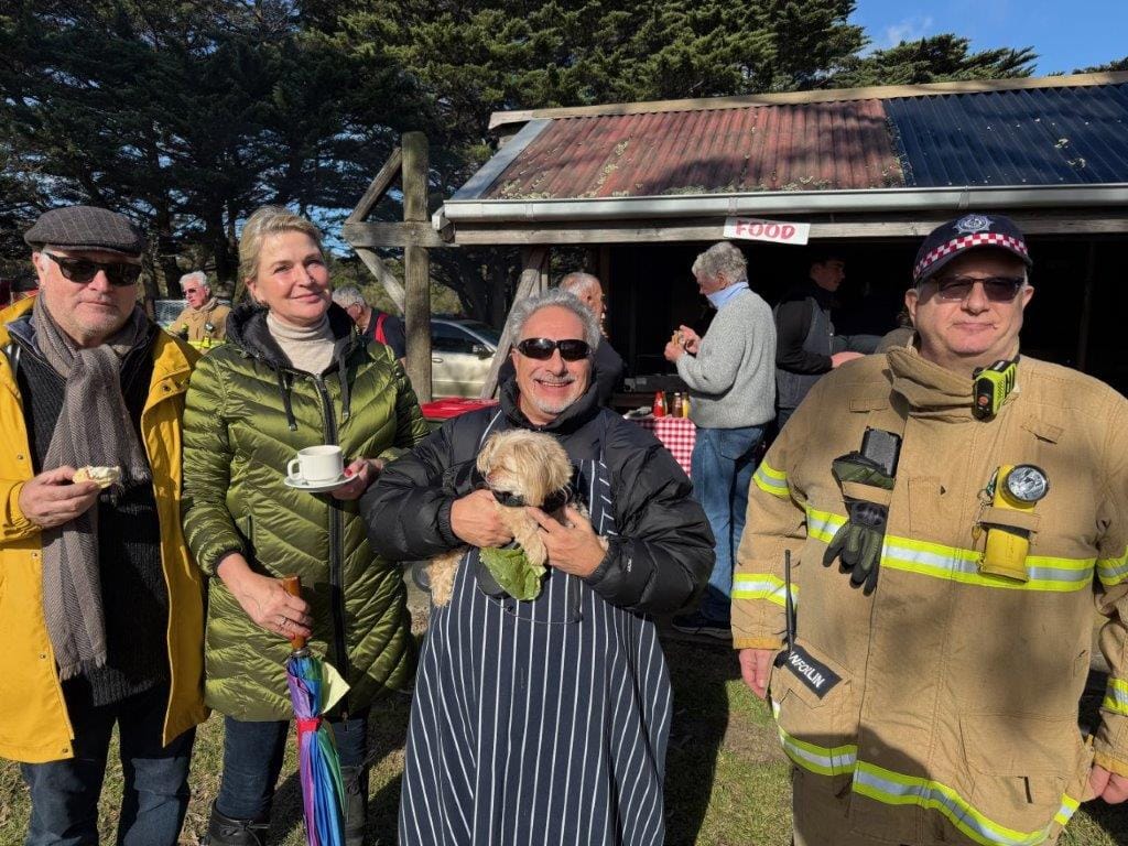 Enjoying the Farmers’ Picnic at the Ventnor Recreation Reserve on Sunday were Rob and Inge Langford with Ron Bauer, ‘Lulu’ the dog and CFA volunteer Silvio Zanforlin.