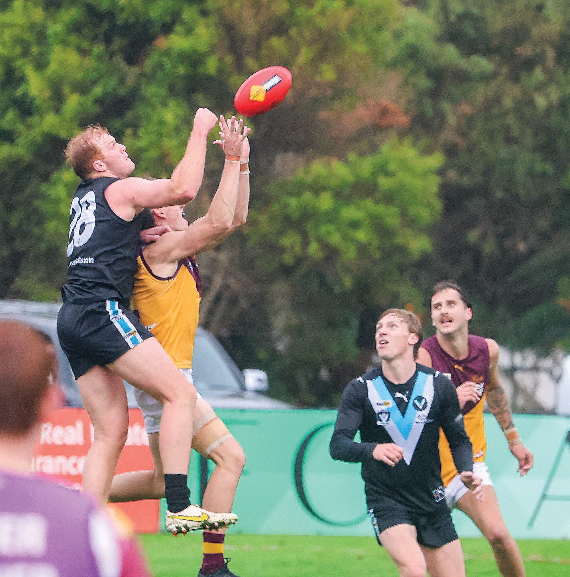 A typical picture of defender Kyle Reid’s impressive body of work for the Power against a plucky Drouin at Wonthaggi on Saturday.