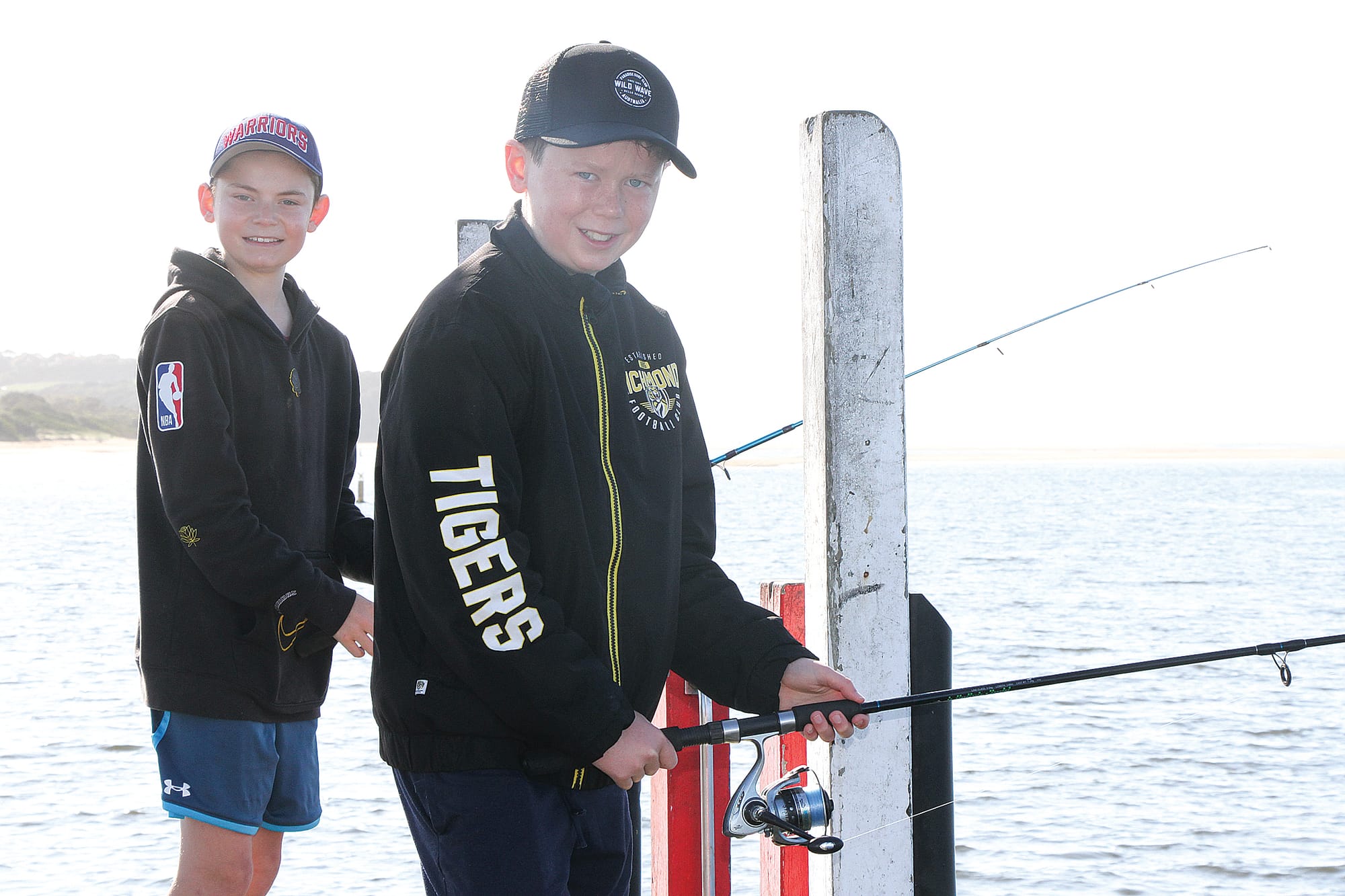 Imminent closure of the Inverloch jetty to facilitate construction not a worry for school holidaymakers Tyler and Lachlan from Melbourne. B23_4124