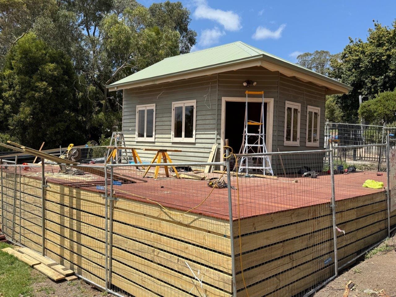 Tradesmen were applying the finishing touches to a new welfare centre at the Loch Primary School on opening day last Wednesday.